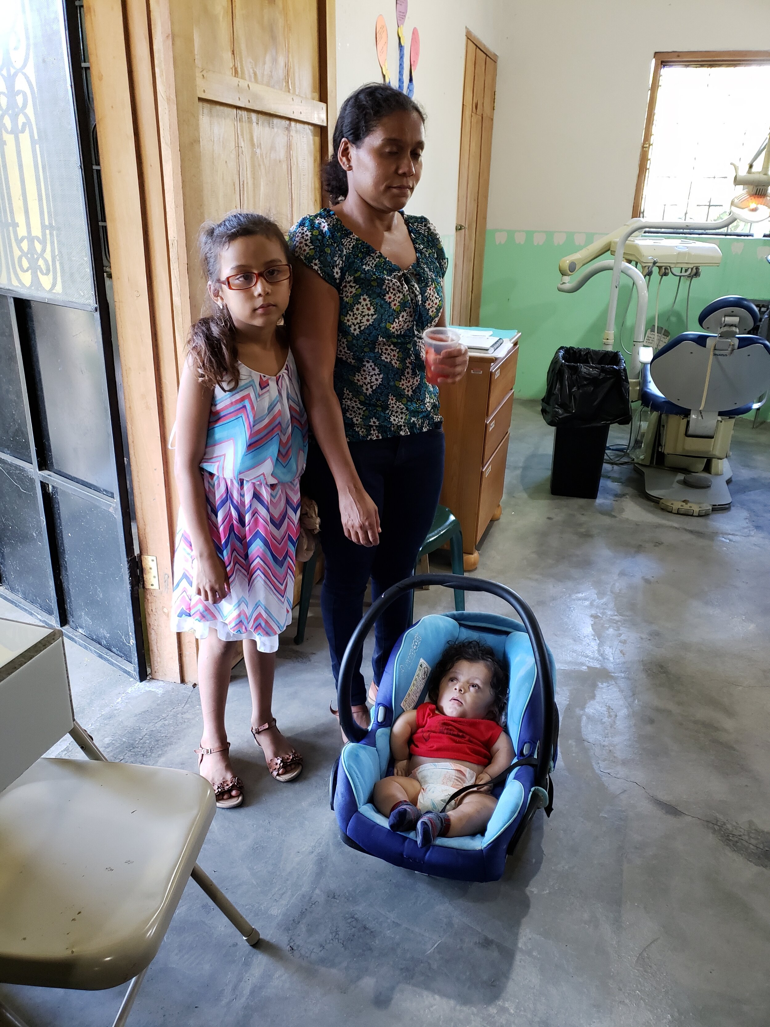 The jornada provided comprehensive screening for over 80 of El Rosario’s youngest children. The infant pictured here was seen with his older sister who had been referred for eyeglasses.