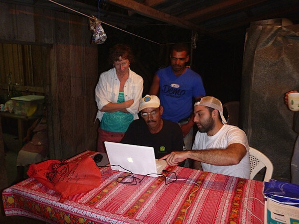 Ann, Ronis and Camilo putting micro bank records on a spread sheet-M.jpg