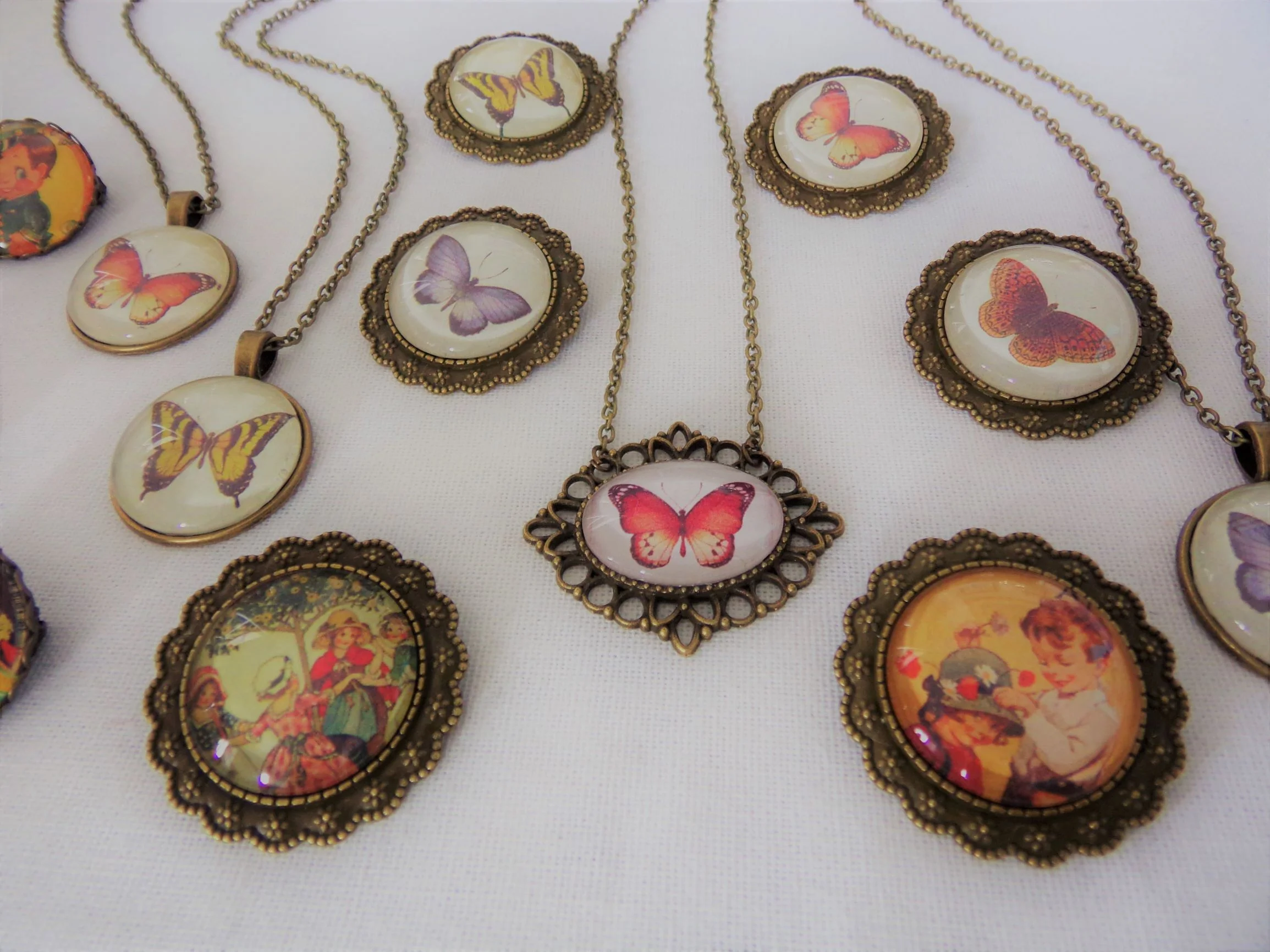 Selection of brooches and pendants