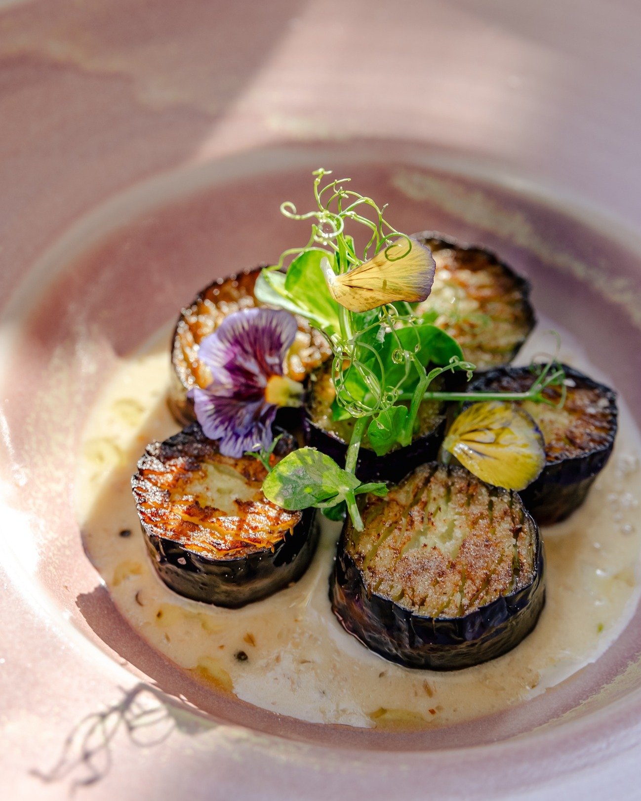 Meet our newest dinner addition: Aubergine au Poivre.

A vegetarian play on the classic steak au poivre, it features seared eggplant in a decadent creamy green peppercorn sauce topped with delicate pea tendrils.

Dinner served Wednesday - Sunday from