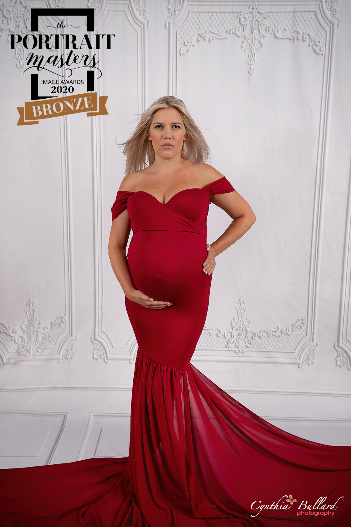 maternity-woman-red-dress-indoor-studio-bronze-award