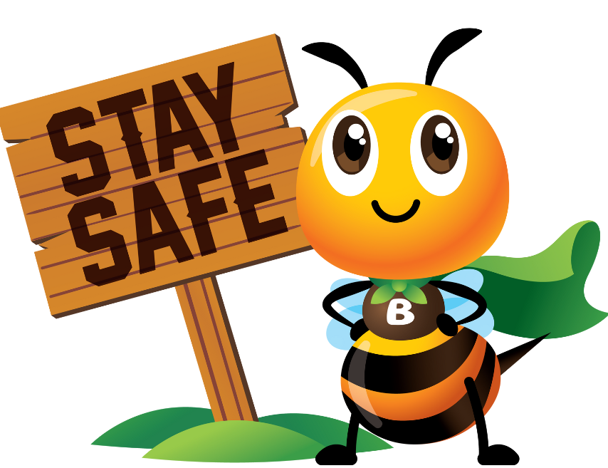 Cartoon bee with a green cape standing next to a wooden sign that reads 'STAY SAFE'.