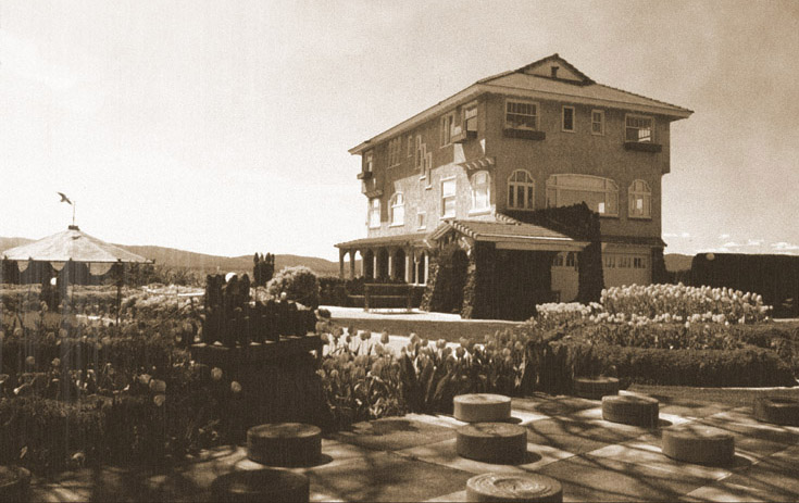 a historical photo of the Cliff House Estate with the life-size checkerboard at the bottom of the frame