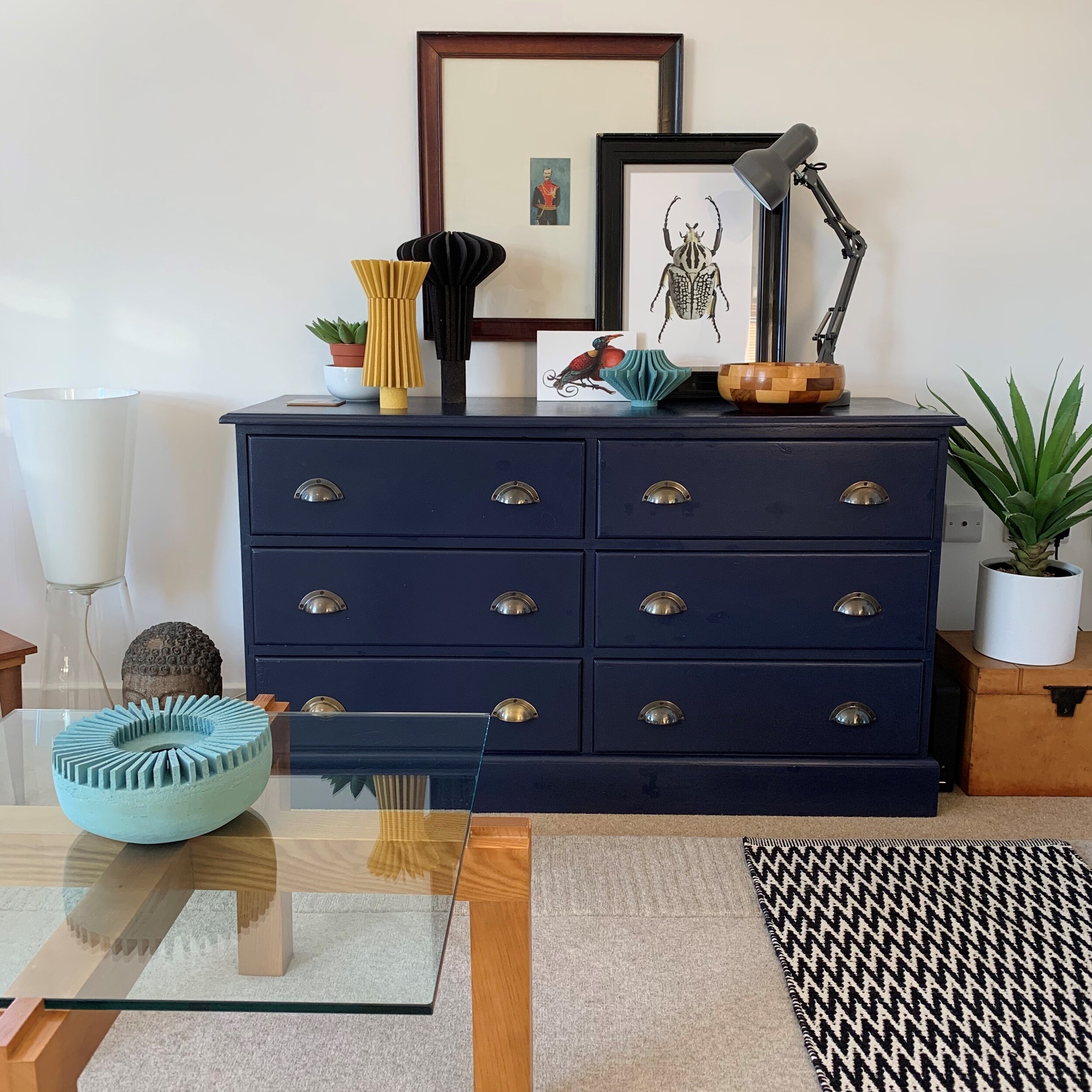 Yellow and turquoise ceramic vase in livingroom