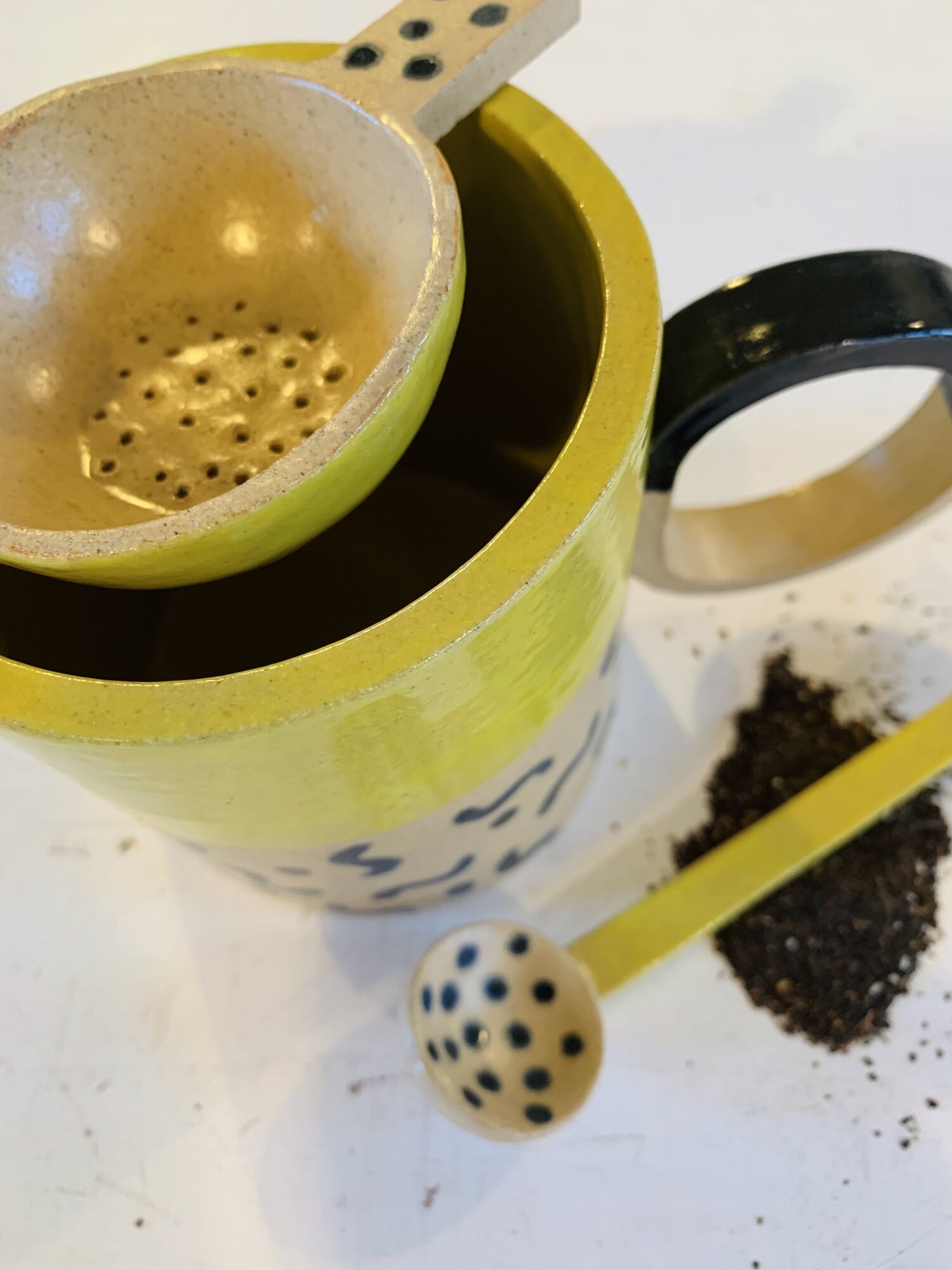 Andrew walker ceramics class yellow black mug set.jpg