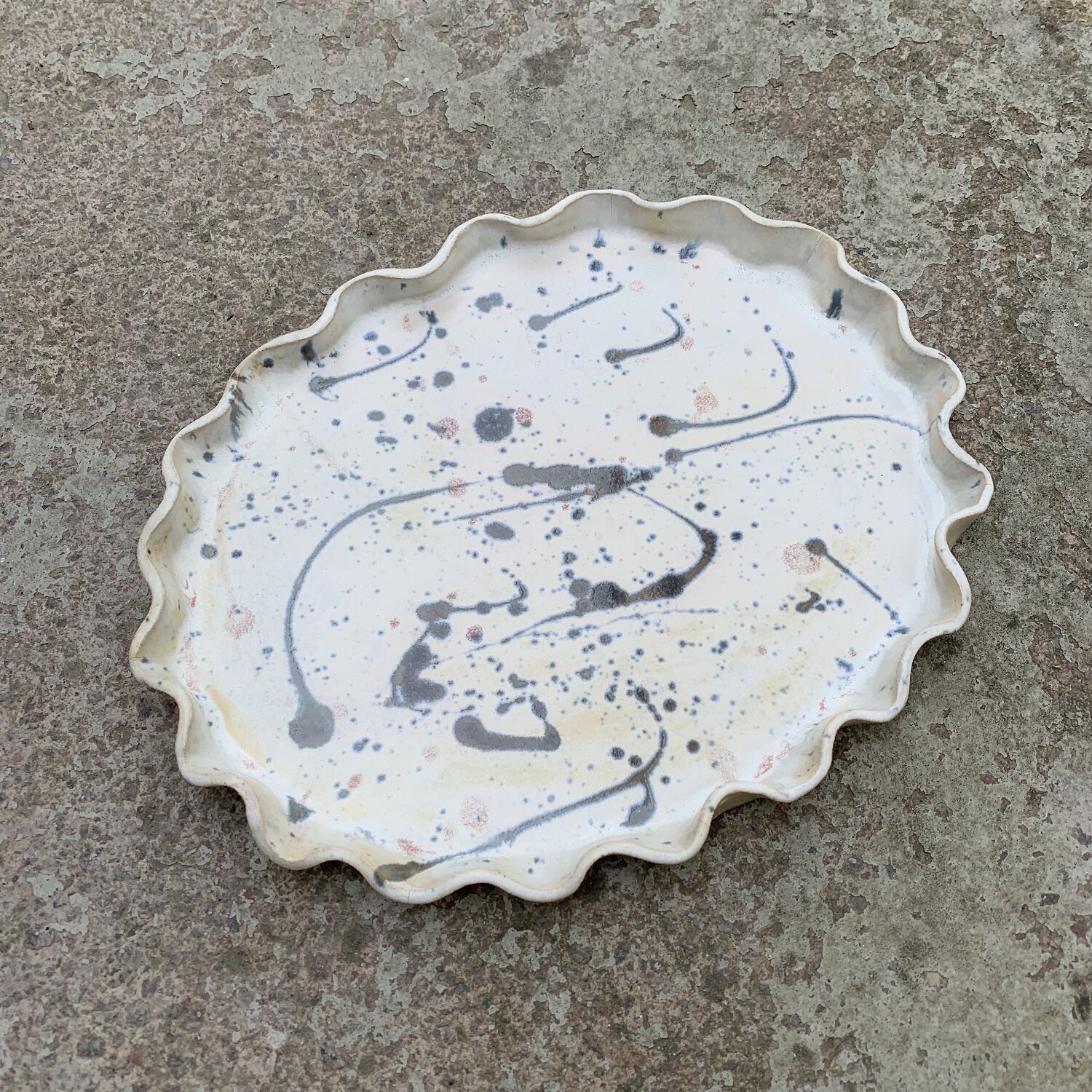 Andrew walker ceramics class student splatter plate.jpg