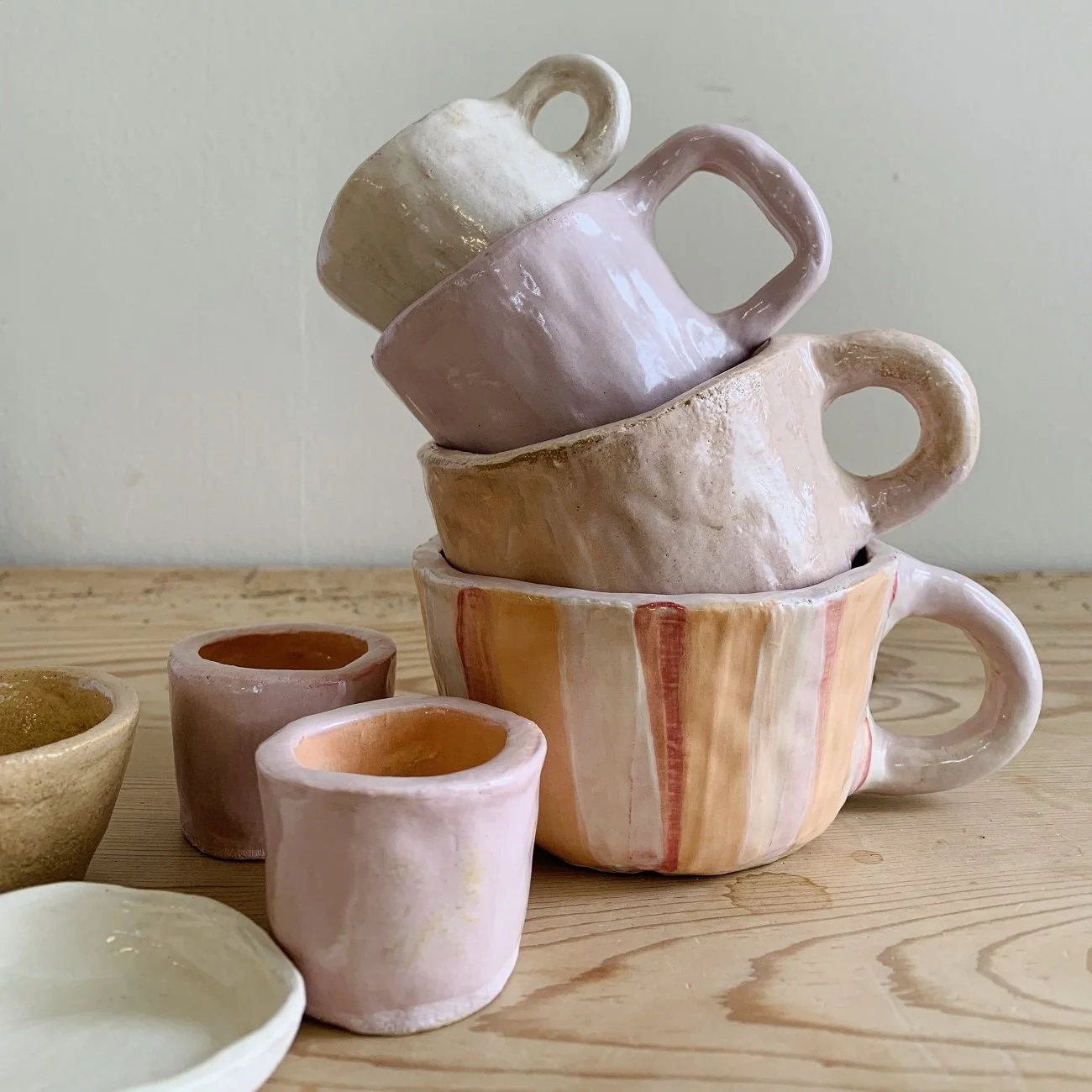Andrew Walker Ceramics Student pink mugs.jpg
