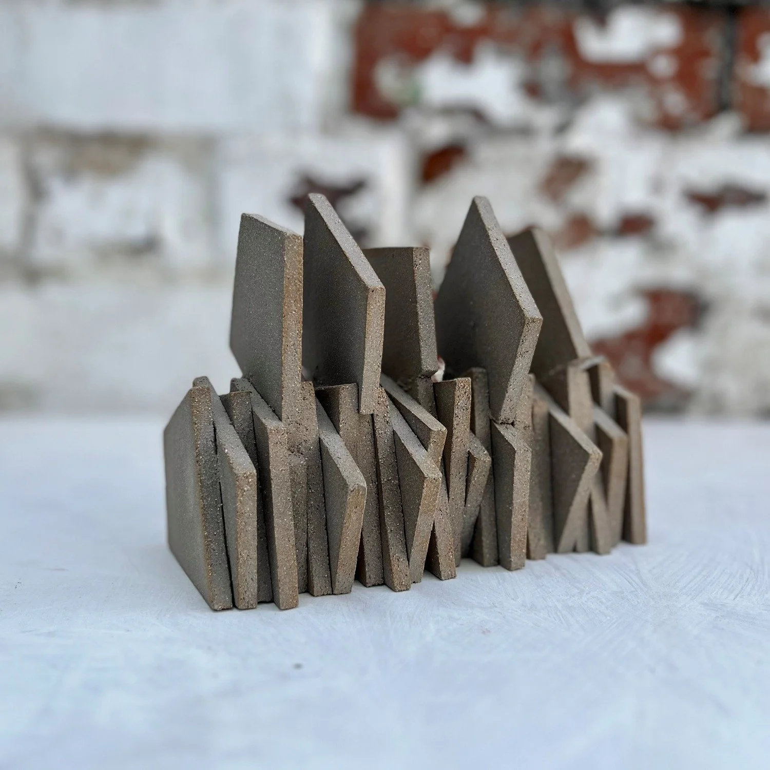 brutalist ceramic sculpture Sheffield car park cheese grater form