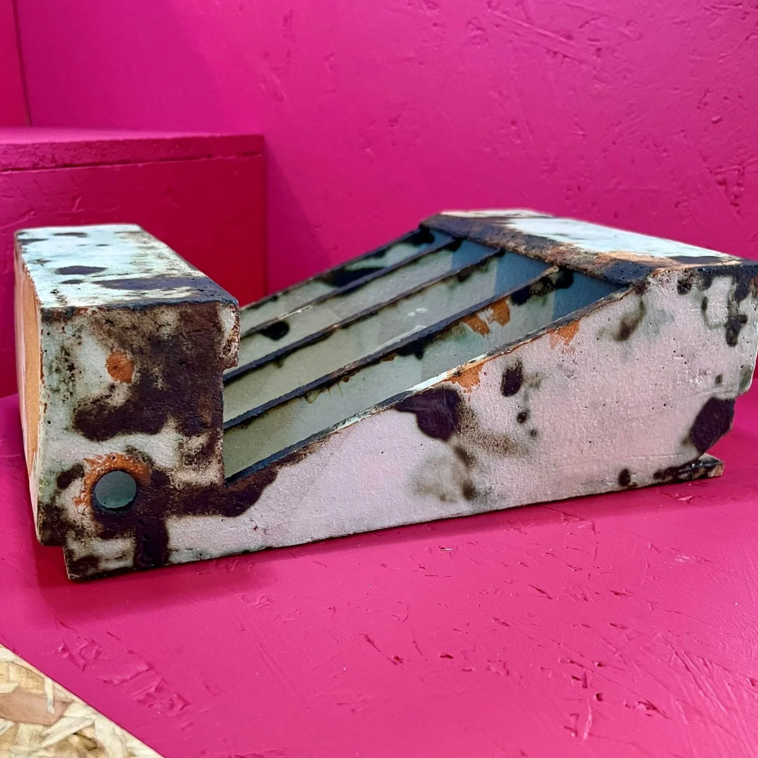 handmade ceramic sculpture perforated geometric form