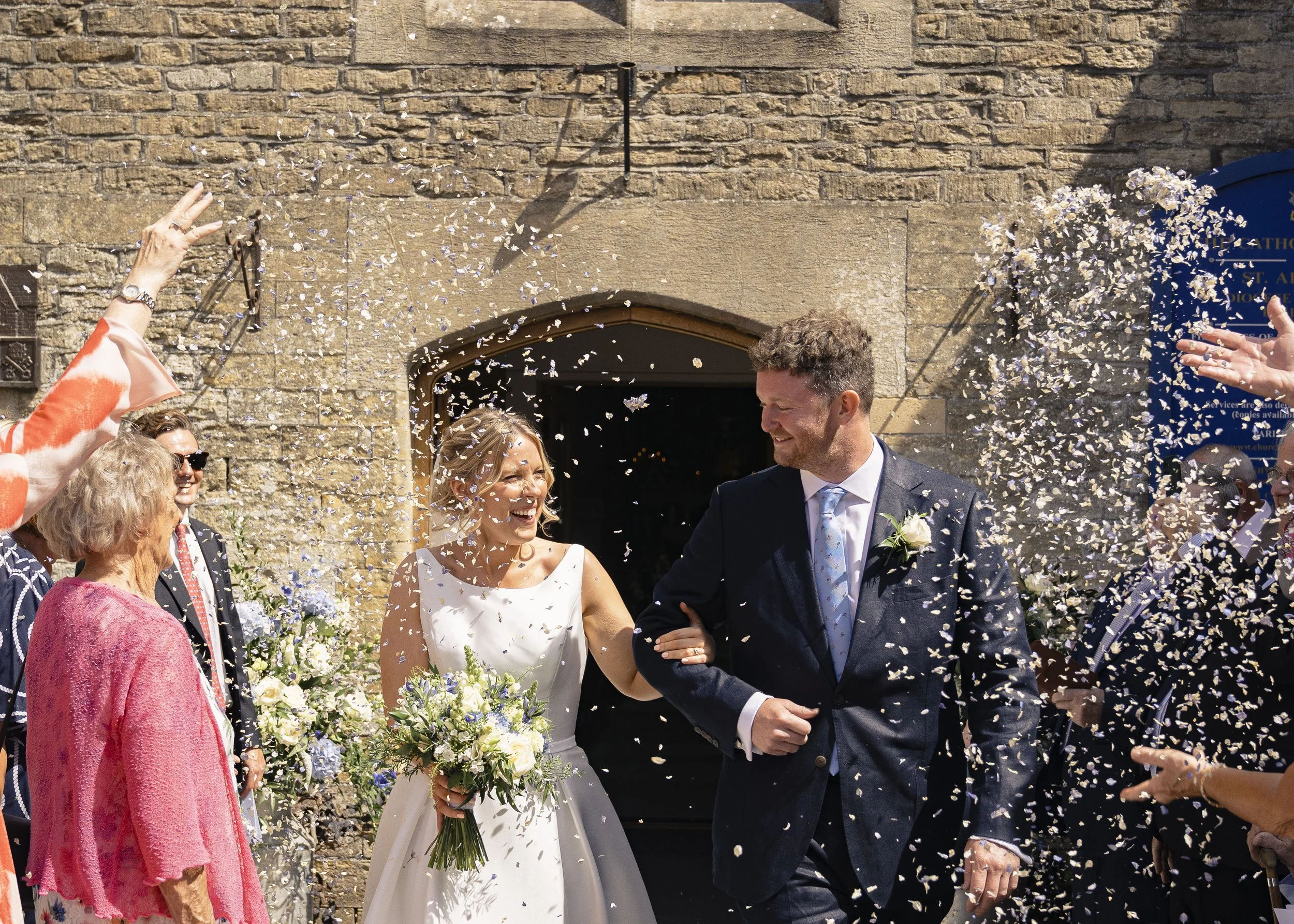 Bride and Groom confetti moment, Winkworth Farm Wedding, Wiltshire