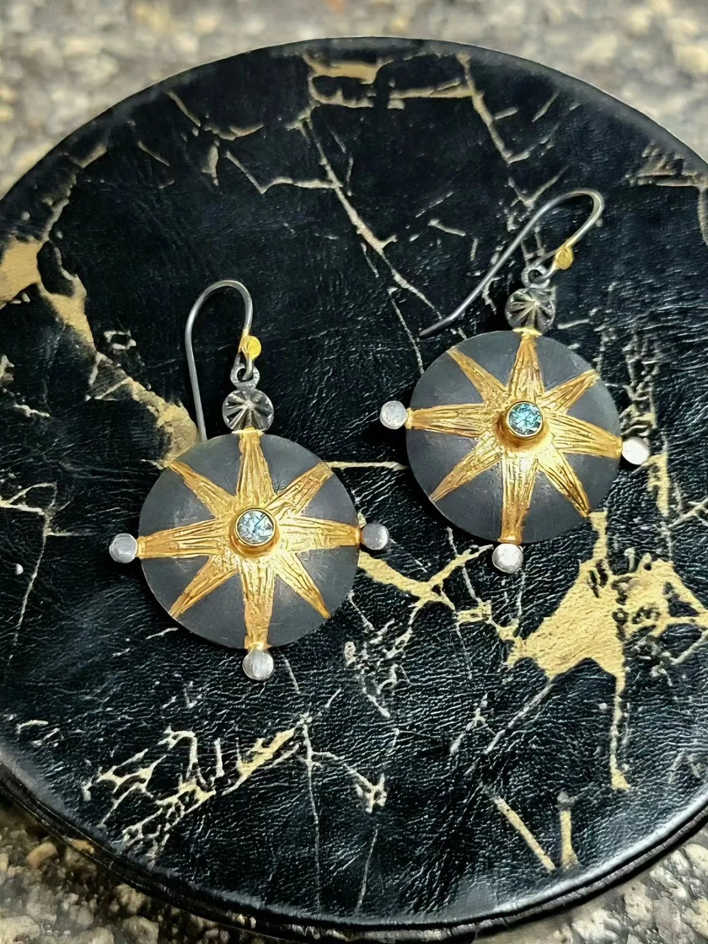 Power shields fit for a light warrior!
🕊🪄🛡🤺🏇
These earrings are one of my top new designs of 2026 so far, and they were scooped up so fast I already get to make the next version! They're inspired by ancient shield designs and especially influenc