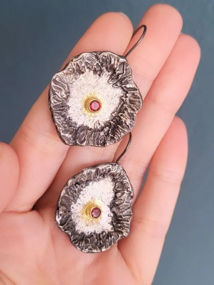 Primordia "Caldera" earrings with fire citrines, Meltsculpt texture, and little Gold Flow lava bursts!
🌋🔥☄️🎇
I've now made three versions of this earring design. Each pair has been melty and firey and full of sass! I have some mini versi