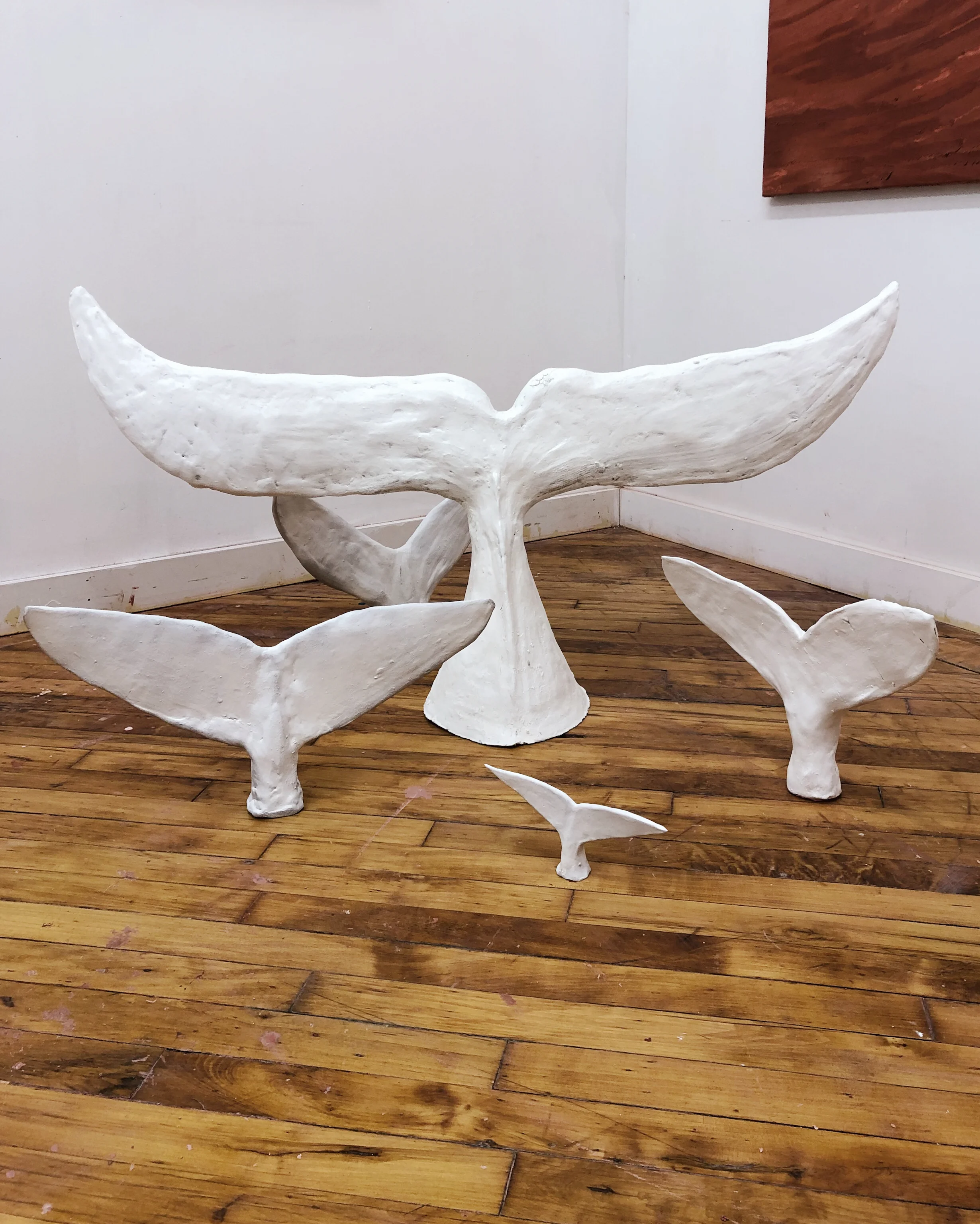 One | A White | Rooted in Spirit | The Symbol, 2019, sculptures of various sizes, clay and paint