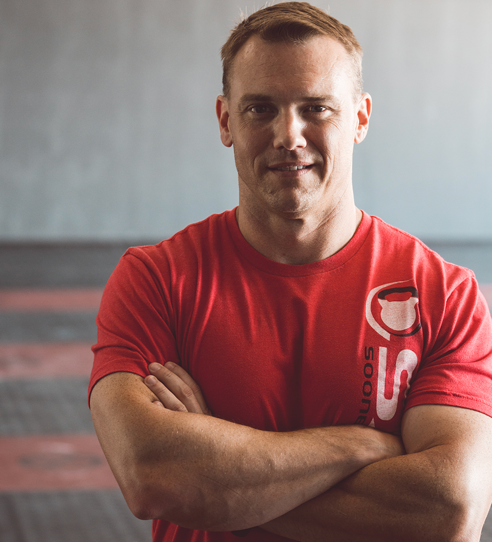 Josh Winfrey | Owner & Head Coach Qualifications CrossFit Level 2 Trainer, CrossFit Weightlifting Trainer, CrossFit Gymnastics Trainer, CrossFit Judges Course, First Aid/CPR/AED certified Sports and fitness have been at the center of Josh’s life from an early age, playing football and baseball through high school and continuing to play baseball in college. After college, his focus transitioned from competitive athletics to a more comprehensive and general physical preparedness required for military service. He has spent the last 17 years as an infantry officer in the Marine Corps, growing and refining his knowledge of human performance and effective training methods. He loves working with individuals and small groups to achieve their goals and is passionate about utilizing his knowledge and experience to help people improve and maximize their potential.