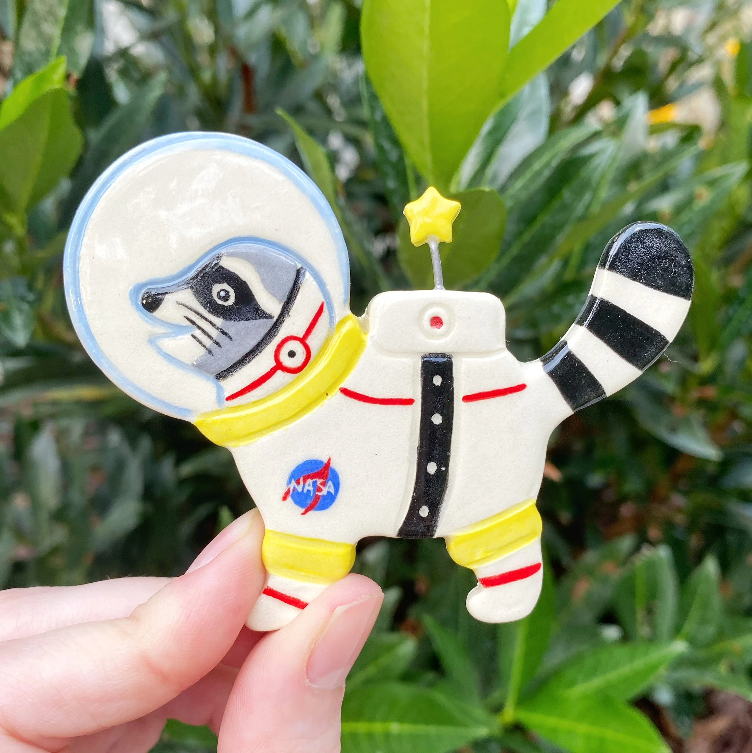 raccoon_astronaut_white_magnet_1.jpeg