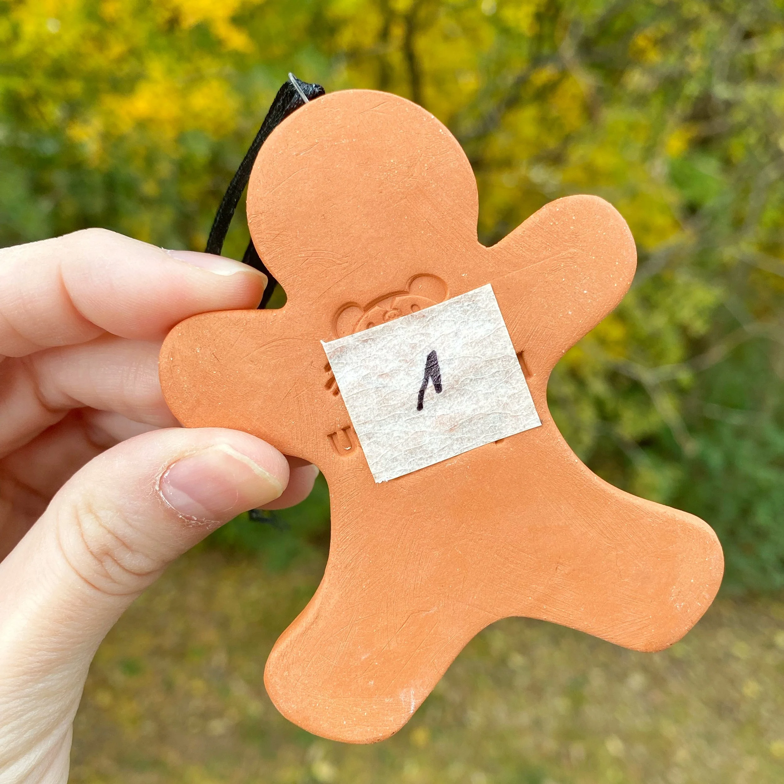 gingerbread_man_skeleton_red_ribbon_1_2.jpg