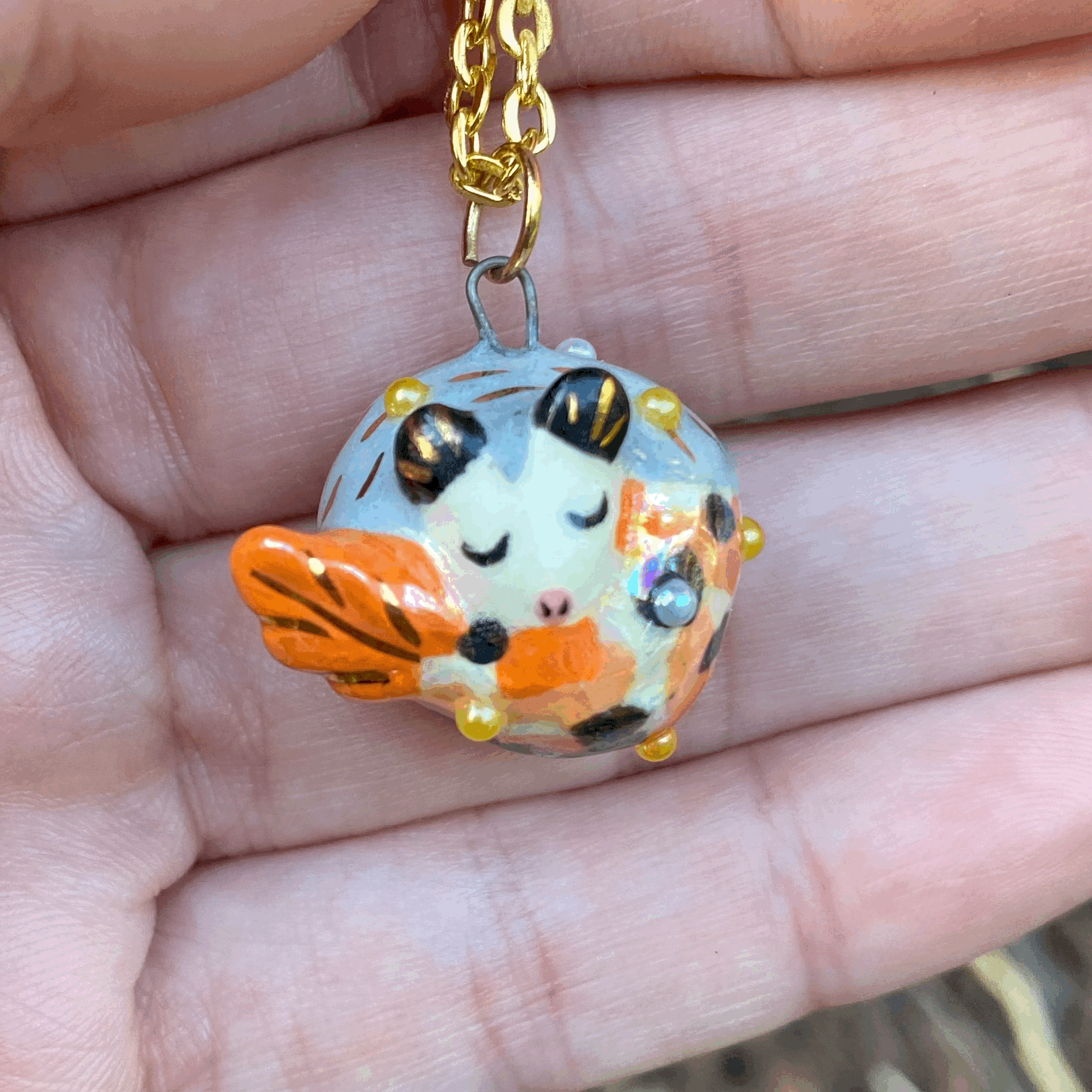 Orange Sleeping Merpossum Necklace