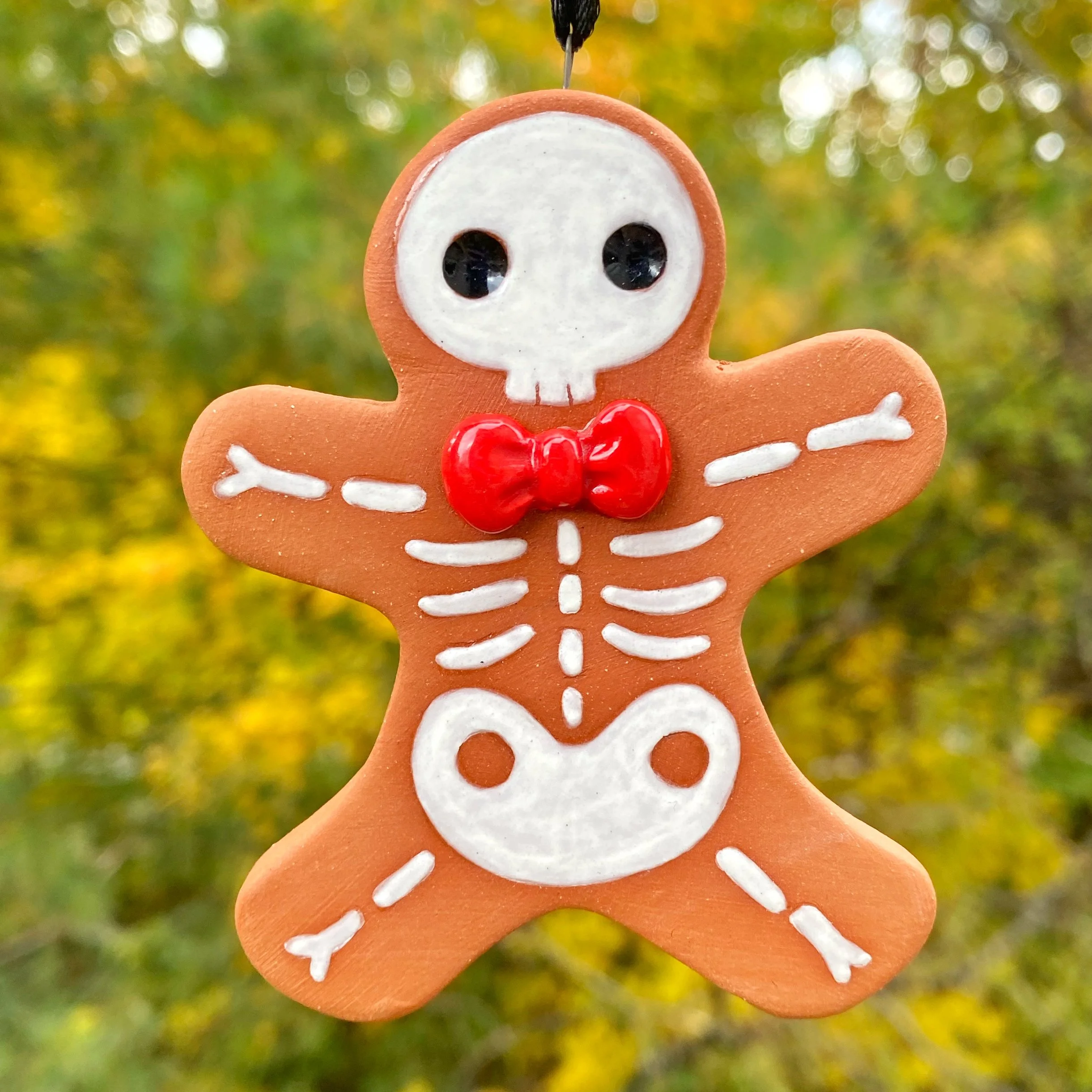 gingerbread_man_skeleton_red_ribbon_2_1.jpg