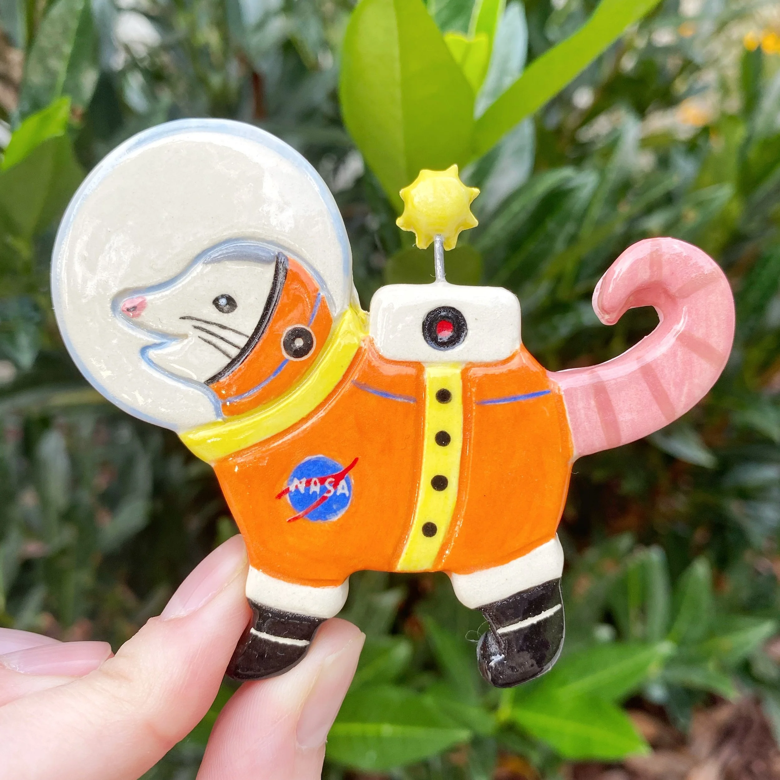 possum_astronaut_orange_magnet_1.jpeg
