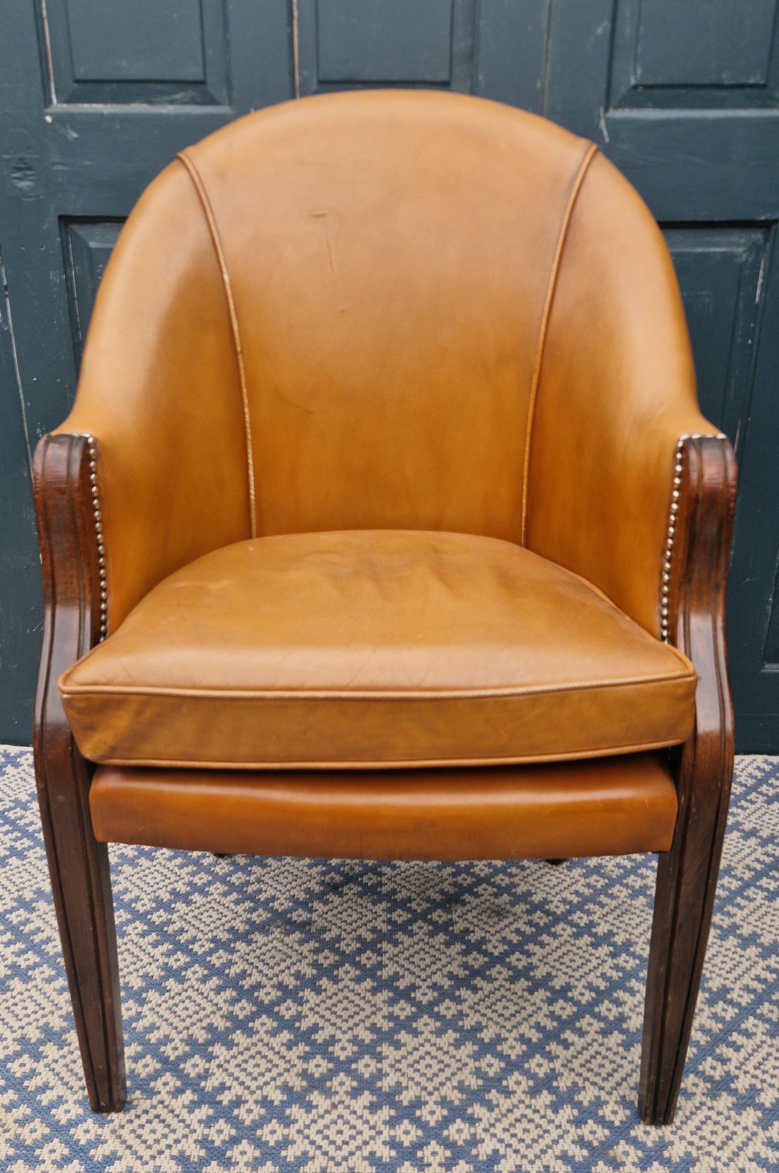 tan leather tub chair 1.jpg