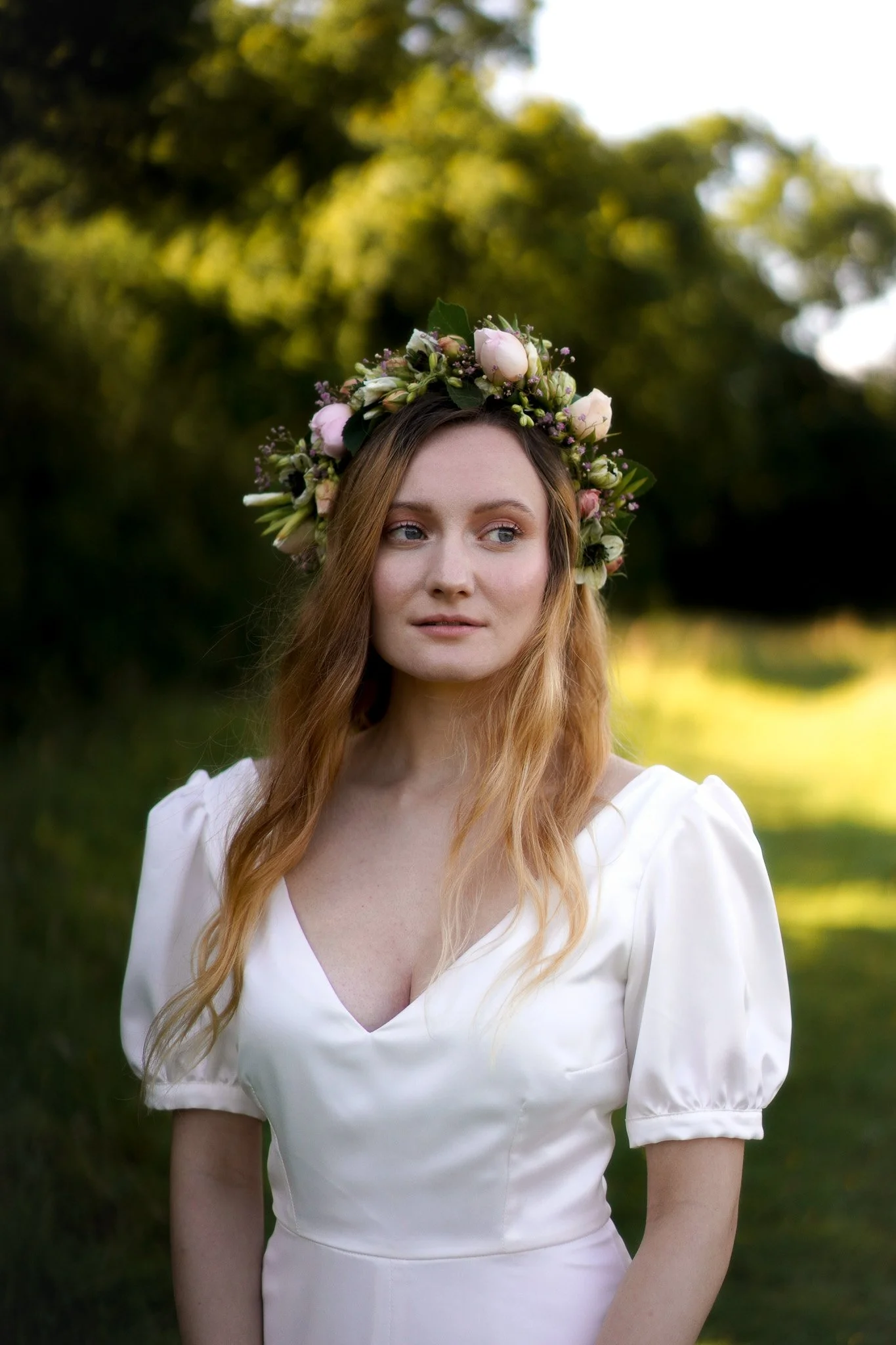 A bride wears a floral bridal crown on her wedding day photographed in Manchester by LGBTQIA+ Friendly photographer Jodie Thackray