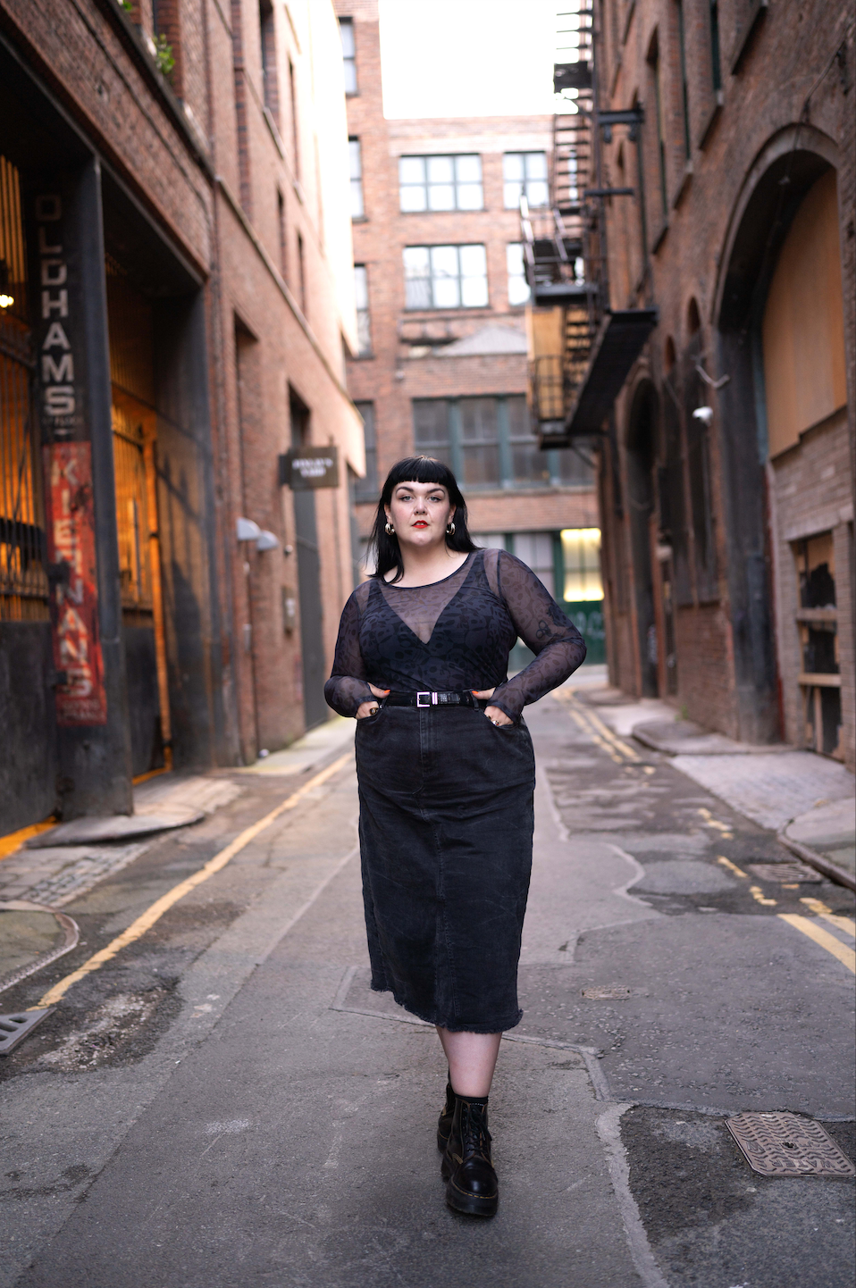 A goth model poses in the northern quarter in Manchester.