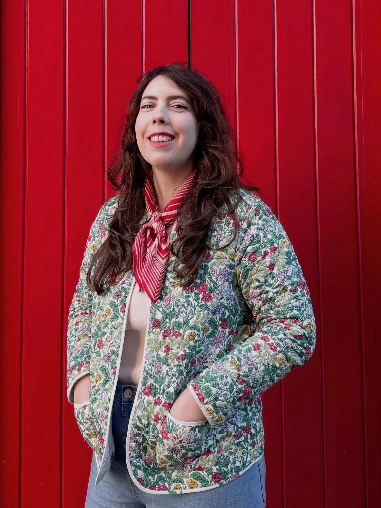 A Manchester based photographer poses for a photograph taken in Ancoats in Manchester City Centre.