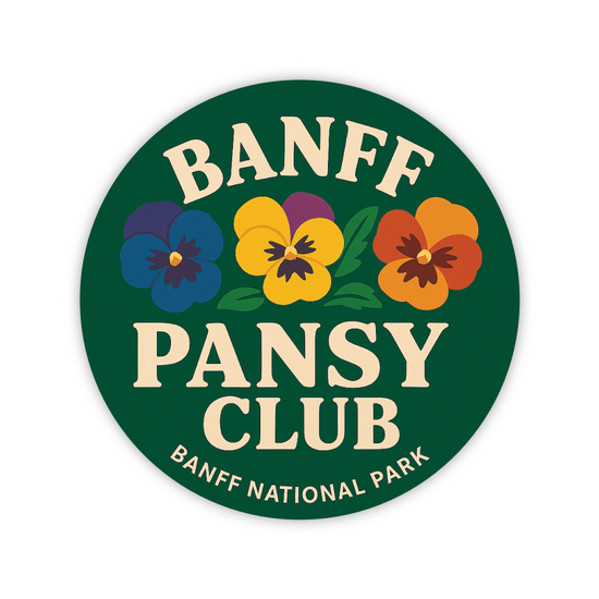 Round green “Banff Pansy Club” button featuring three colourful pansy flowers and the text “Banff National Park.”