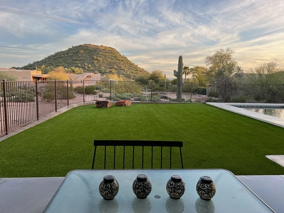 What are some benefits to switching to artificial turf? 