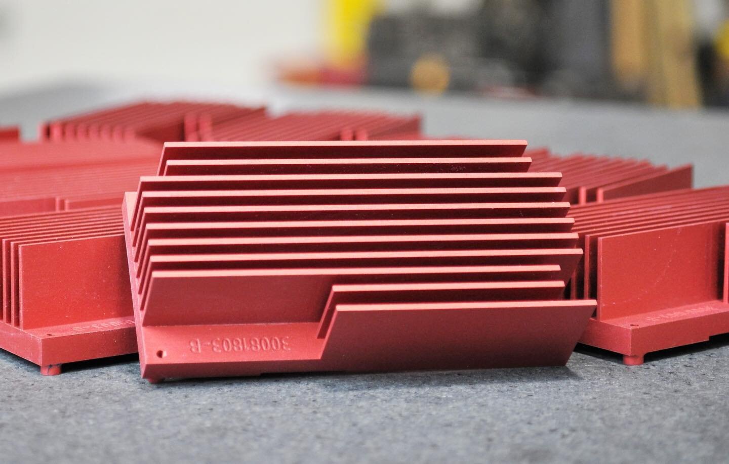 Sometimes I find things are cool not because they're fancy, simply because they're not what I see at the shop everyday.  These anodized heat sinks just came back from the platers and the red was a nice perk on a cold Monday at the shop.