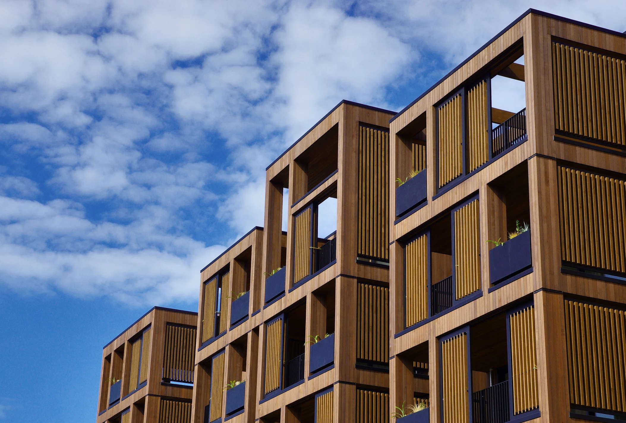 Clear wood coatings make for a stunning visual appeal, however often come with a heavy maintenance schedule. With most leading NZ stain manufacturers specifying a recoat/maintenance cycle of 1-2 years, the cost for owning assets clad in cedar or oth…