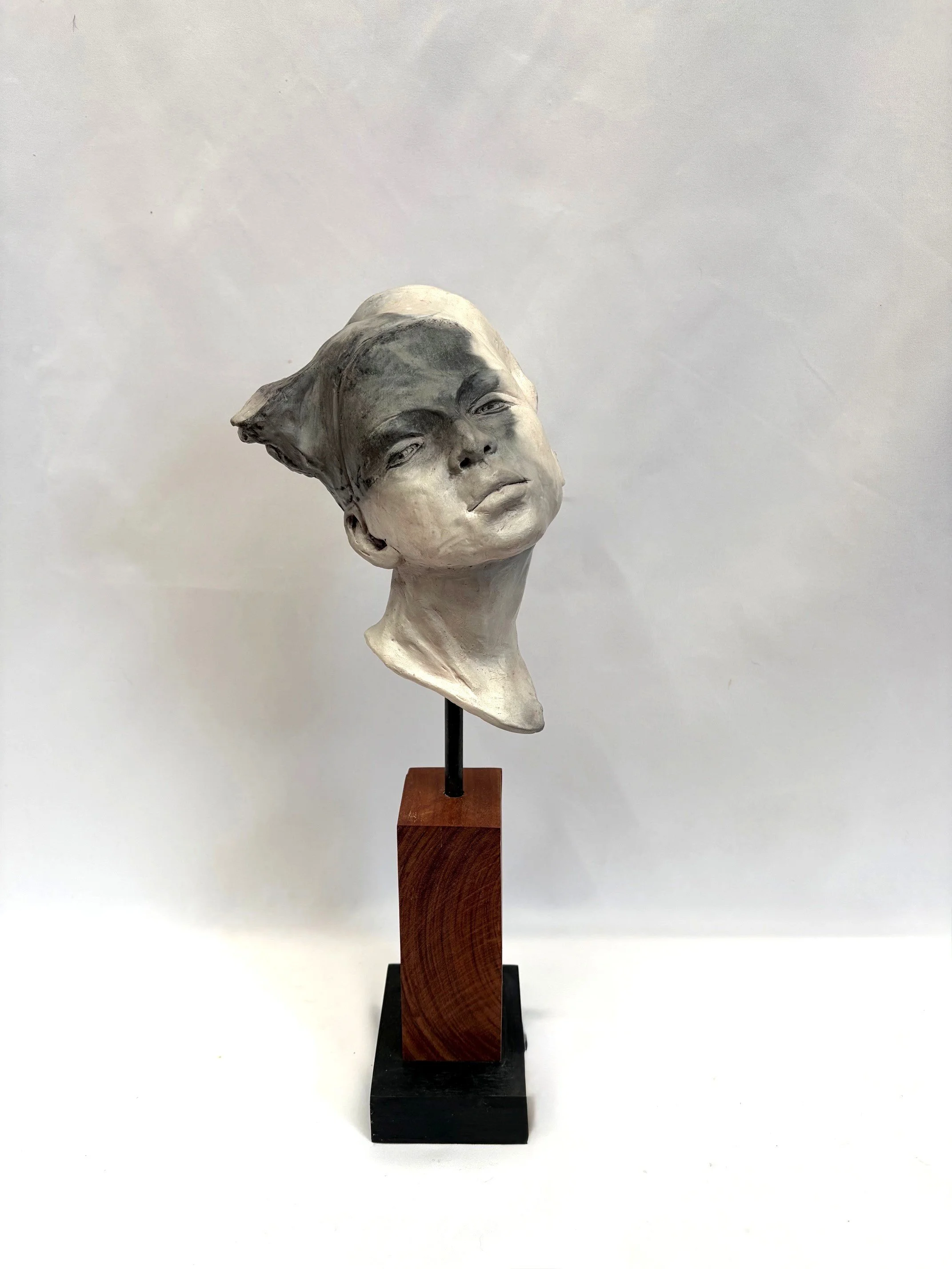 Behind the eyes.