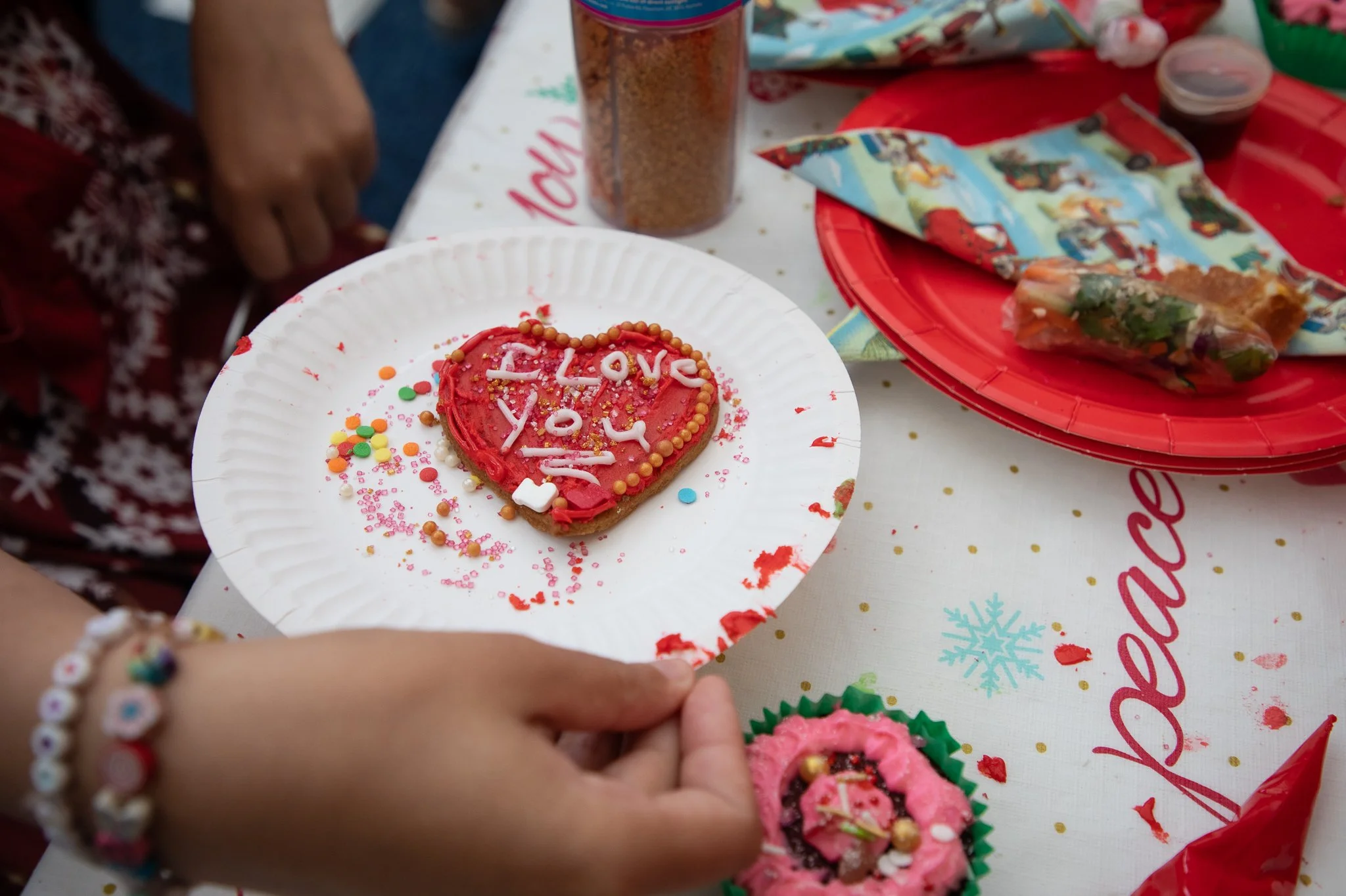 Cookie decorating at the Christmas party.