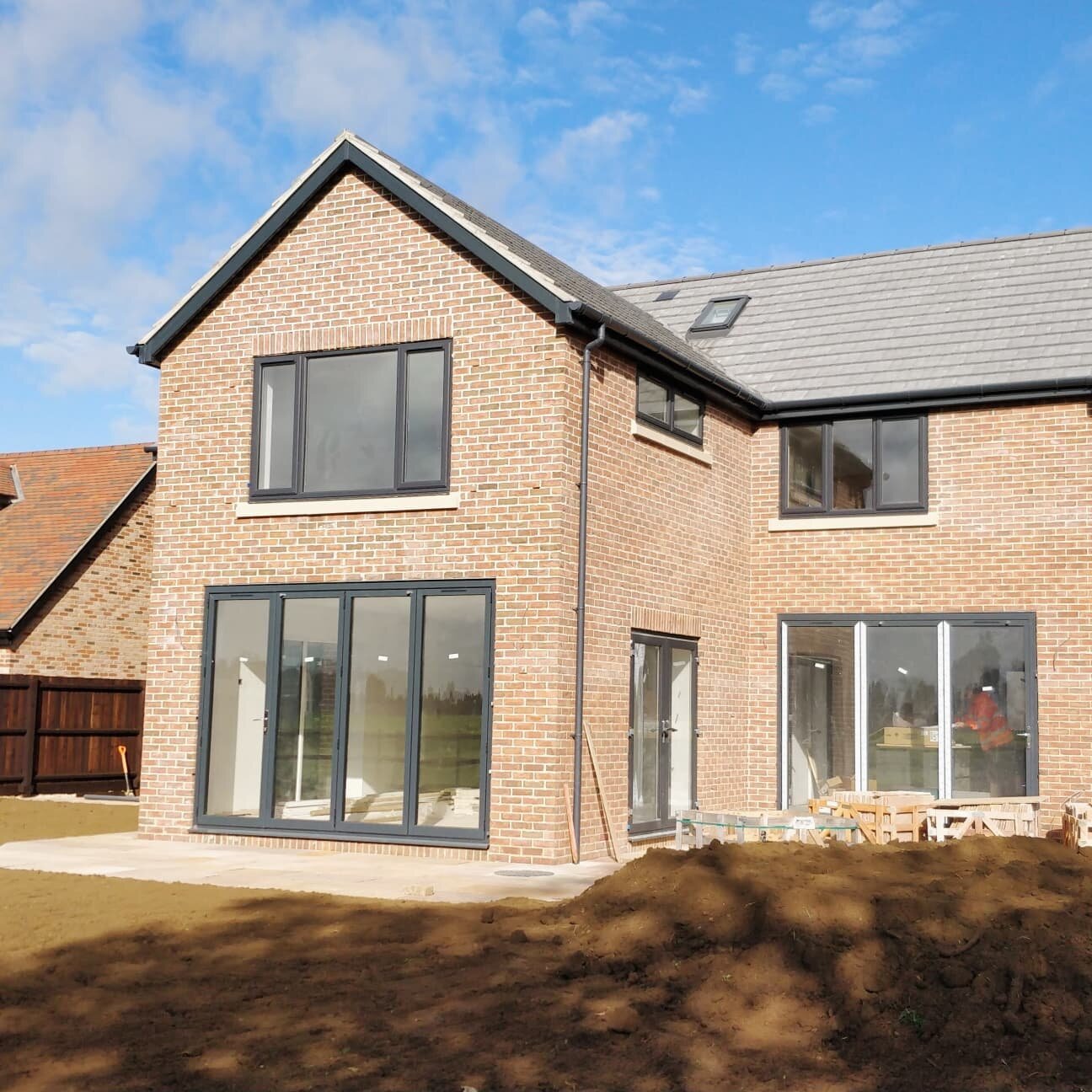 Stunning views out to the south facing garden from our Greenfields development fast approaching completion. You could have your morning coffee in the kitchen or enjoy it in the triple aspect windowed living room, with bifold doors wide open. We look 