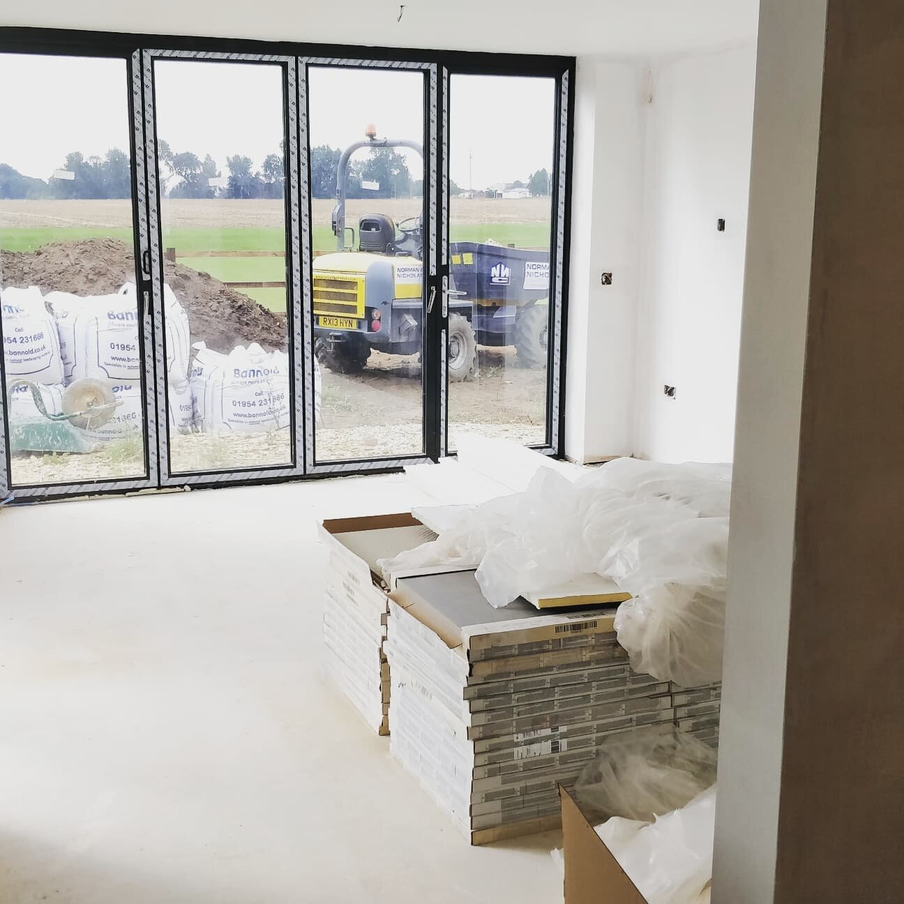 Plenty of action at Greenfields this last week as we rush to prepare for the kitchen installation. Tiling has begun, as well as staircase installation, internal doors and much more. Clients who have registered on www.greenfieldswilburton.co.uk will b