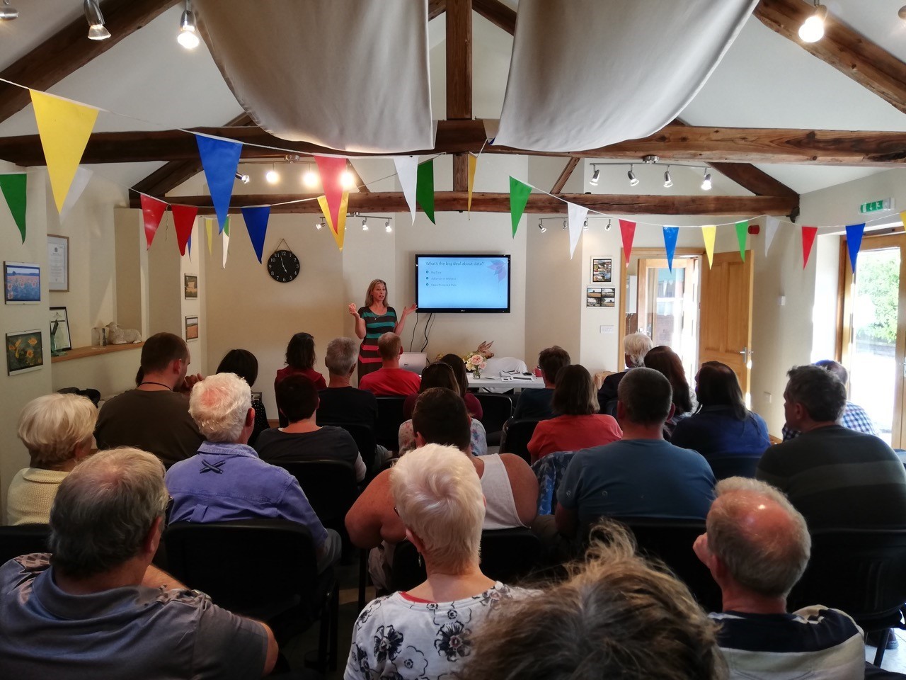 Presenting the new theory of change at the Cart Shed summer celebration.