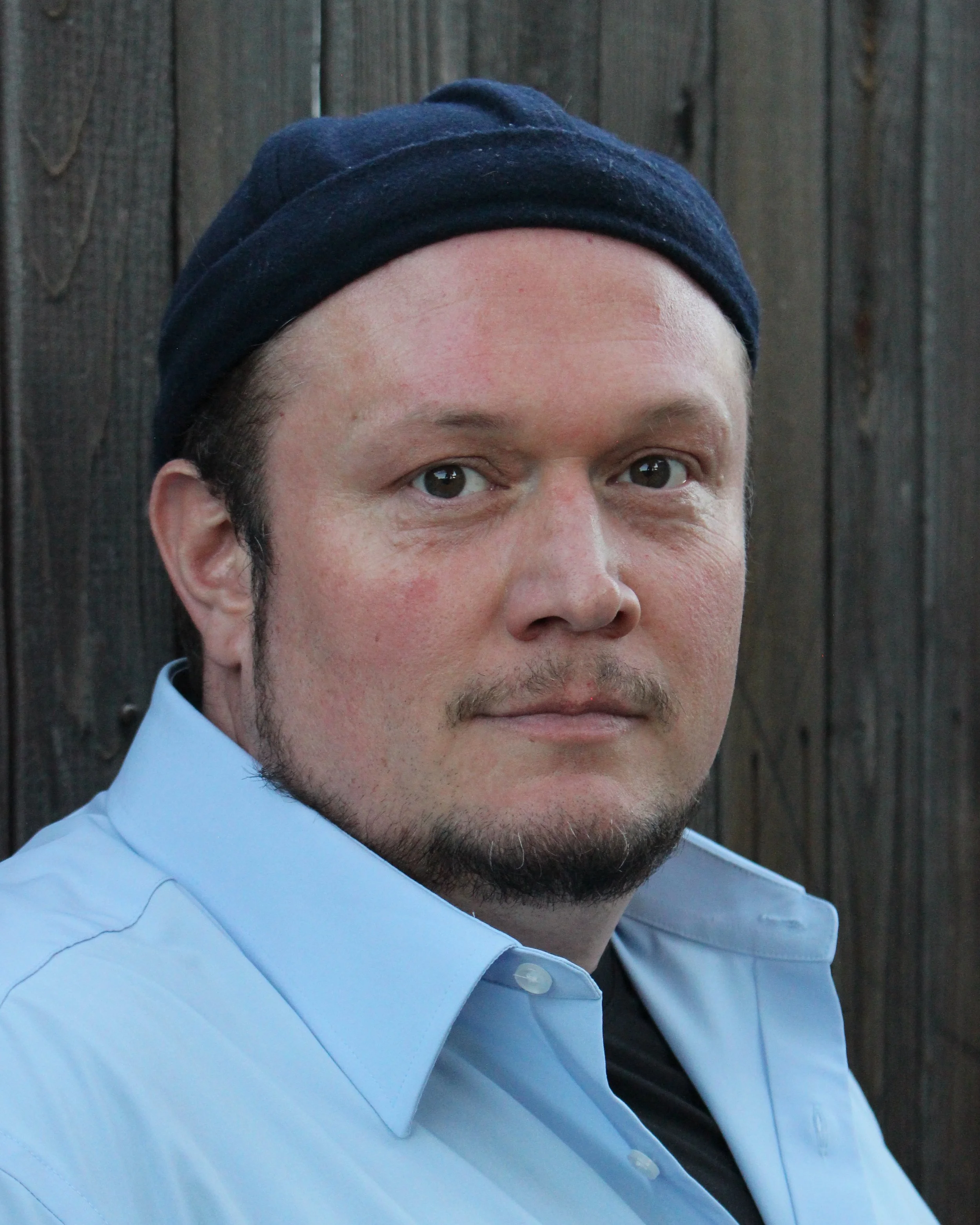 Sammie Joe Kinnett, actor, in a blue hat.