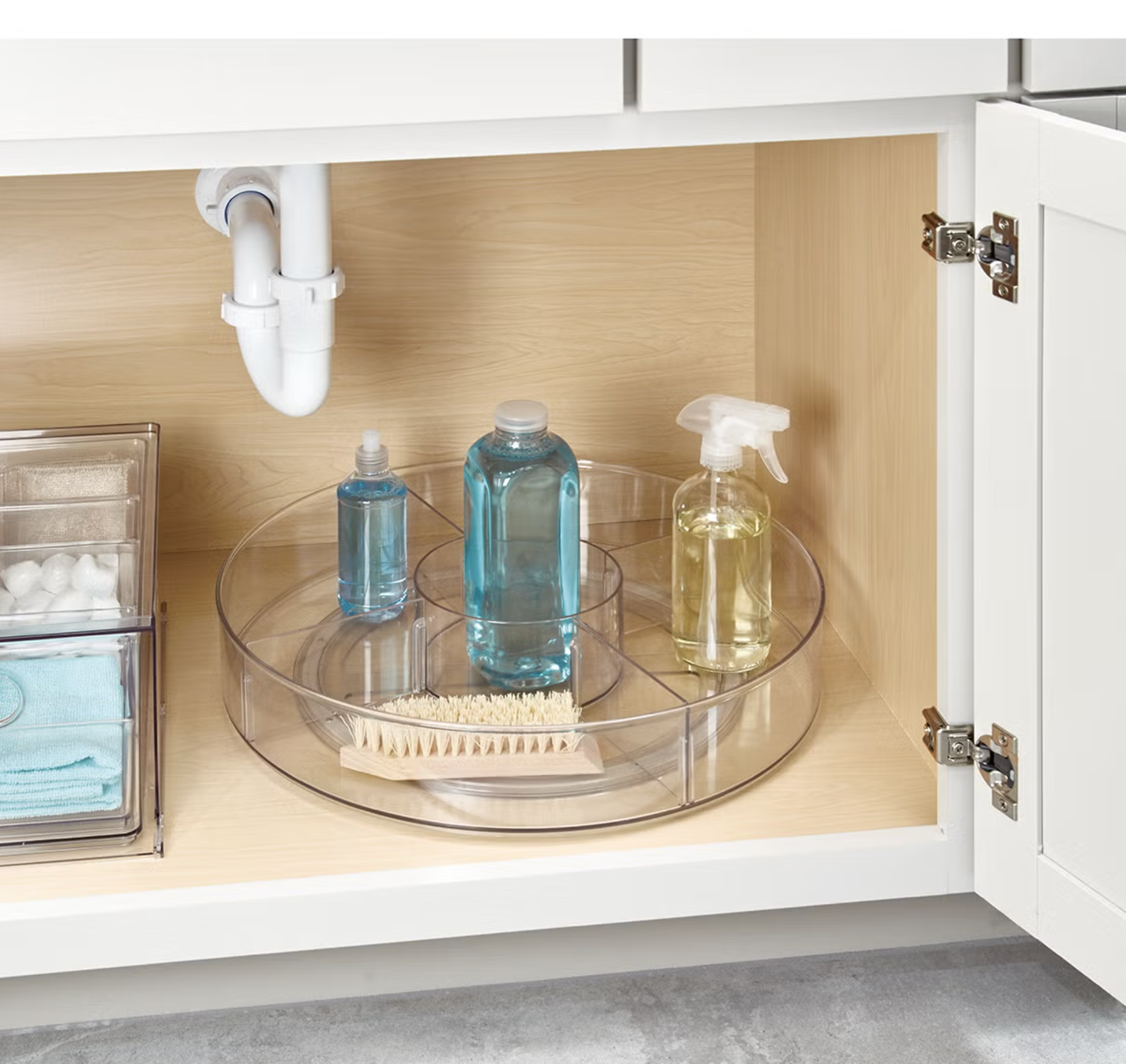  18" D. Although this has dividers, they are removable (center is not). We love the deep sides for added security! 