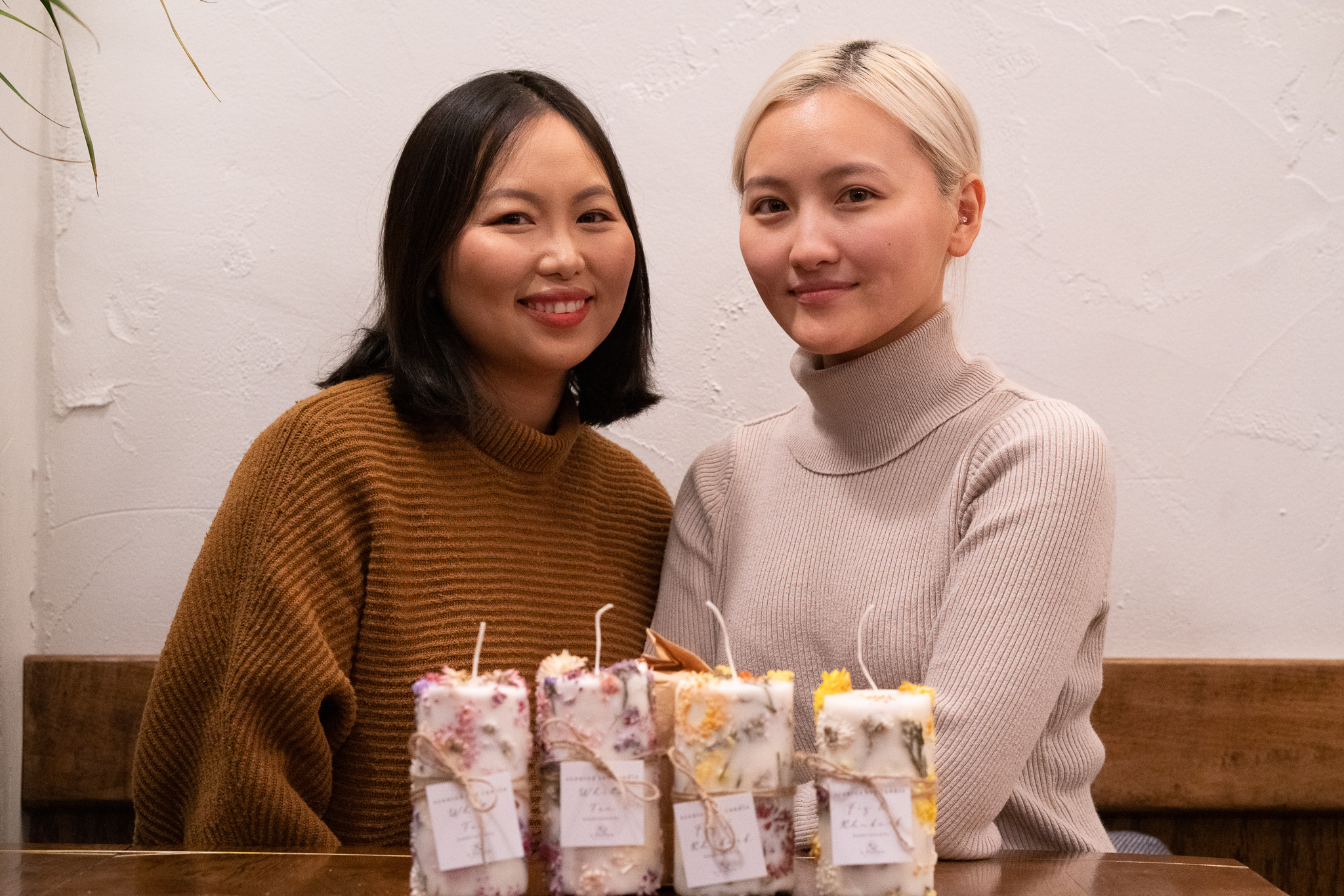 With floral candles, Hmong sisters honor parents' farming legacy