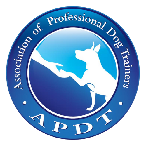 Logo of the American Professional Dog Trainers (APDT) featuring a silhouette of a dog and a hand on a blue circular background.