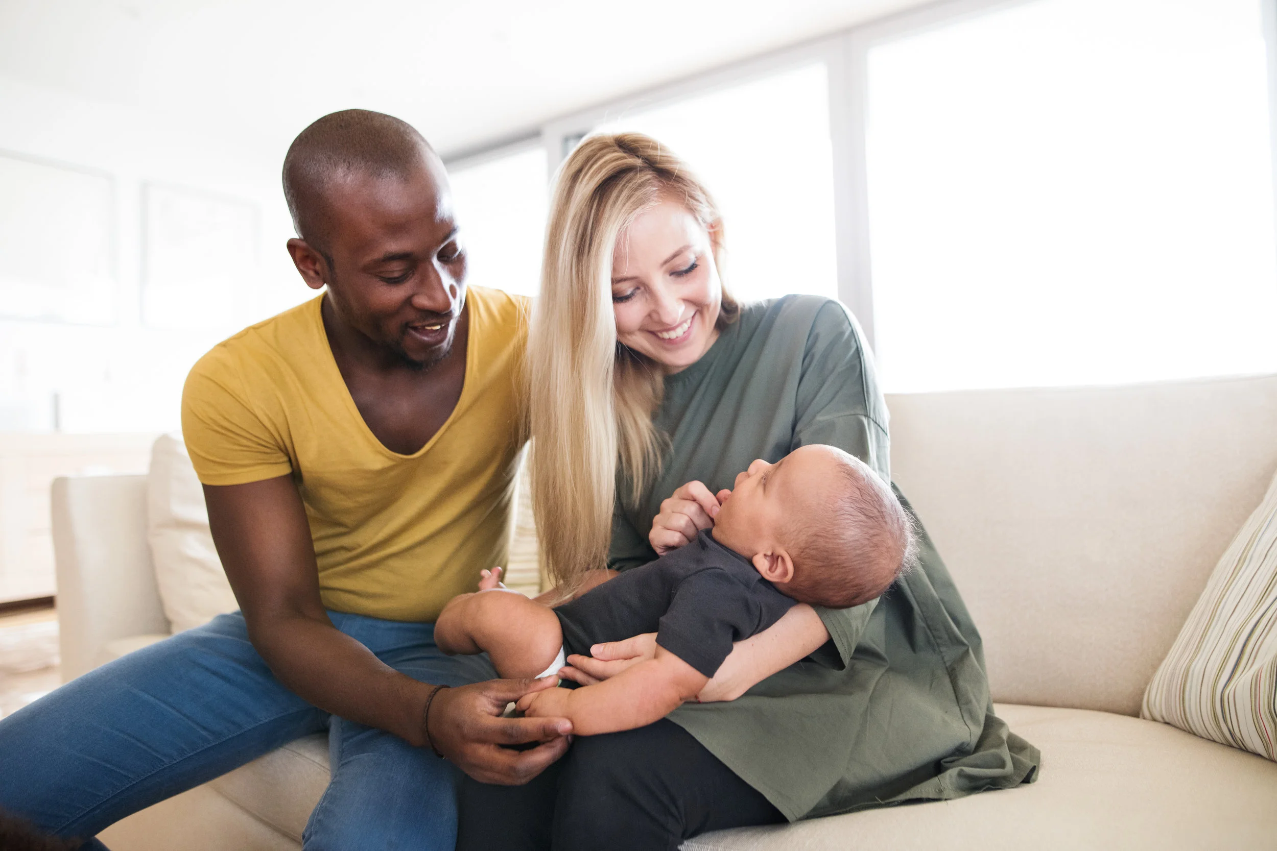 young-interracial-family-with-little-baby-son-at-P3RX43G.jpg