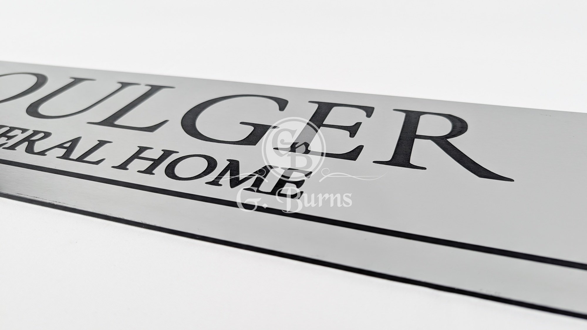 signature-engraved-hearse-nameplate-brushed-nickel-closeup-gburns.jpg