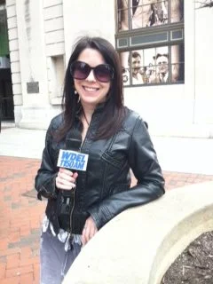 Amy outside a station event on Market Street in downtown Wilmington