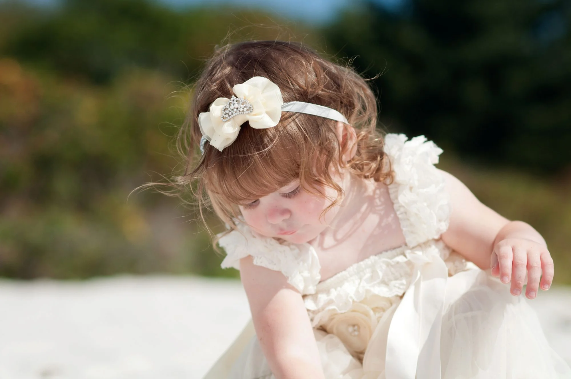 Close up of little girl at the beach