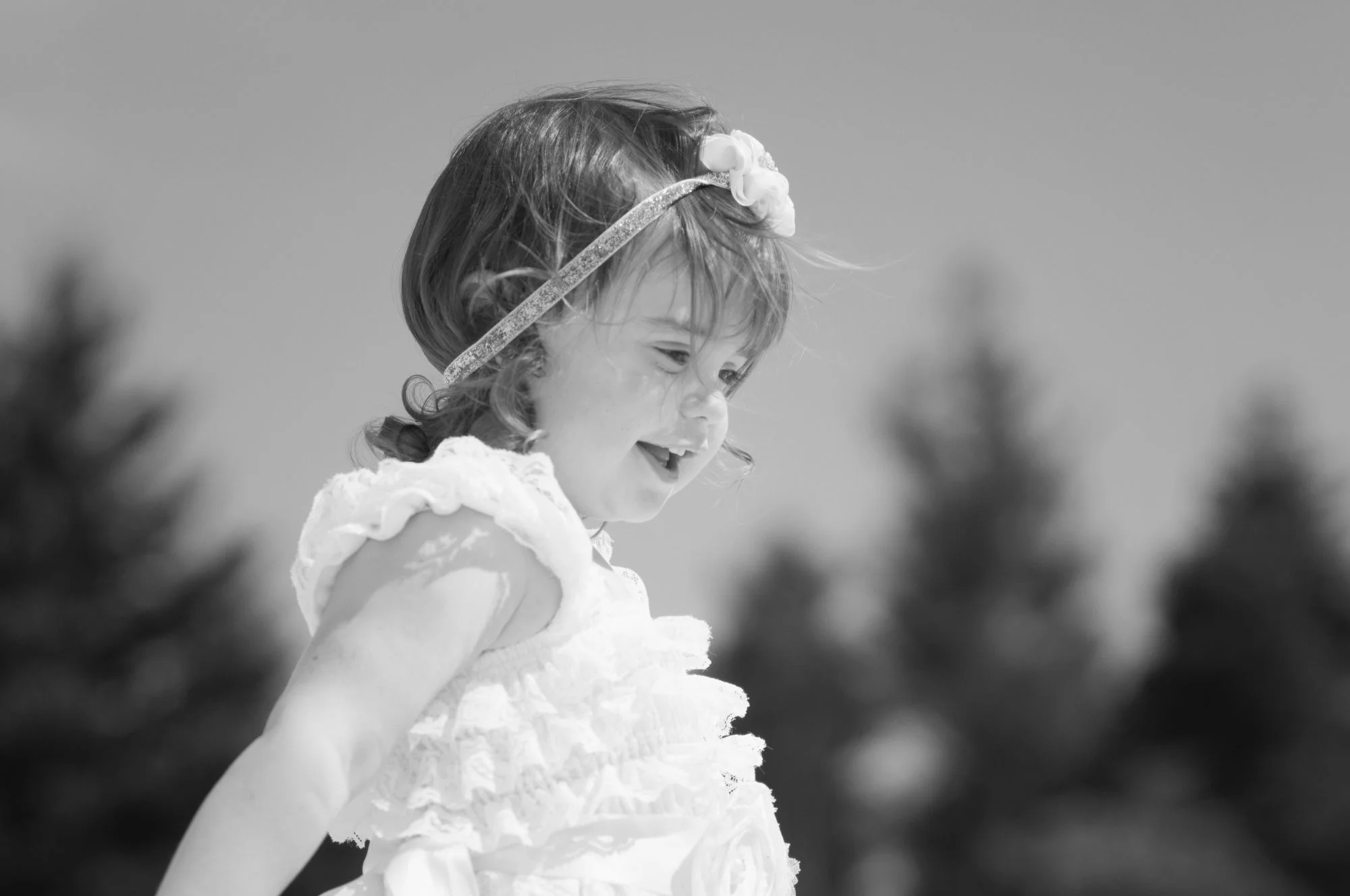 Black and white close up of little girl