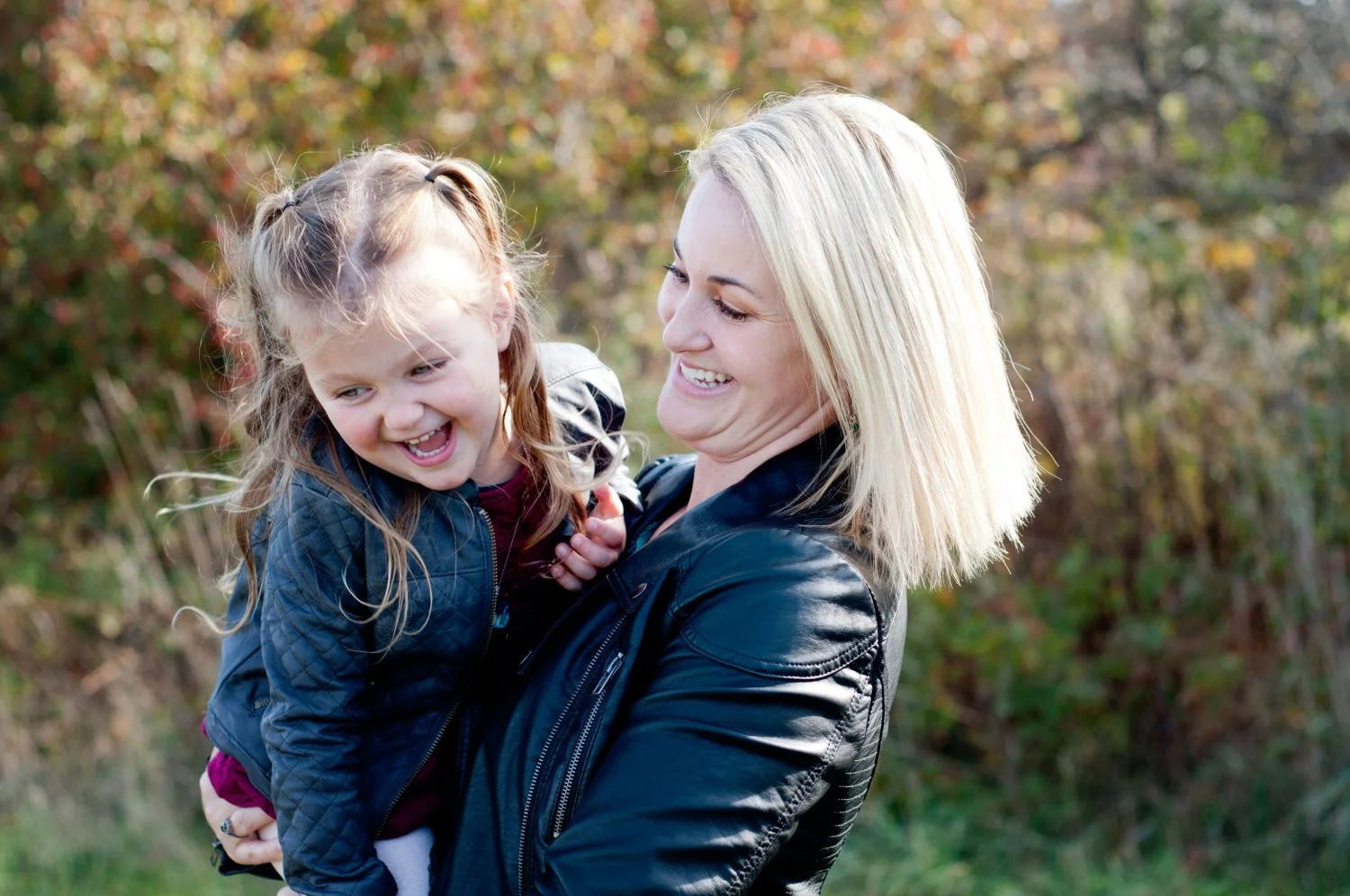 silly photo of mother and daughter