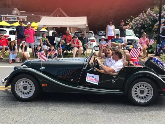 Stacey and her husband, Jack, in the Dunwoody 4th of July Parade