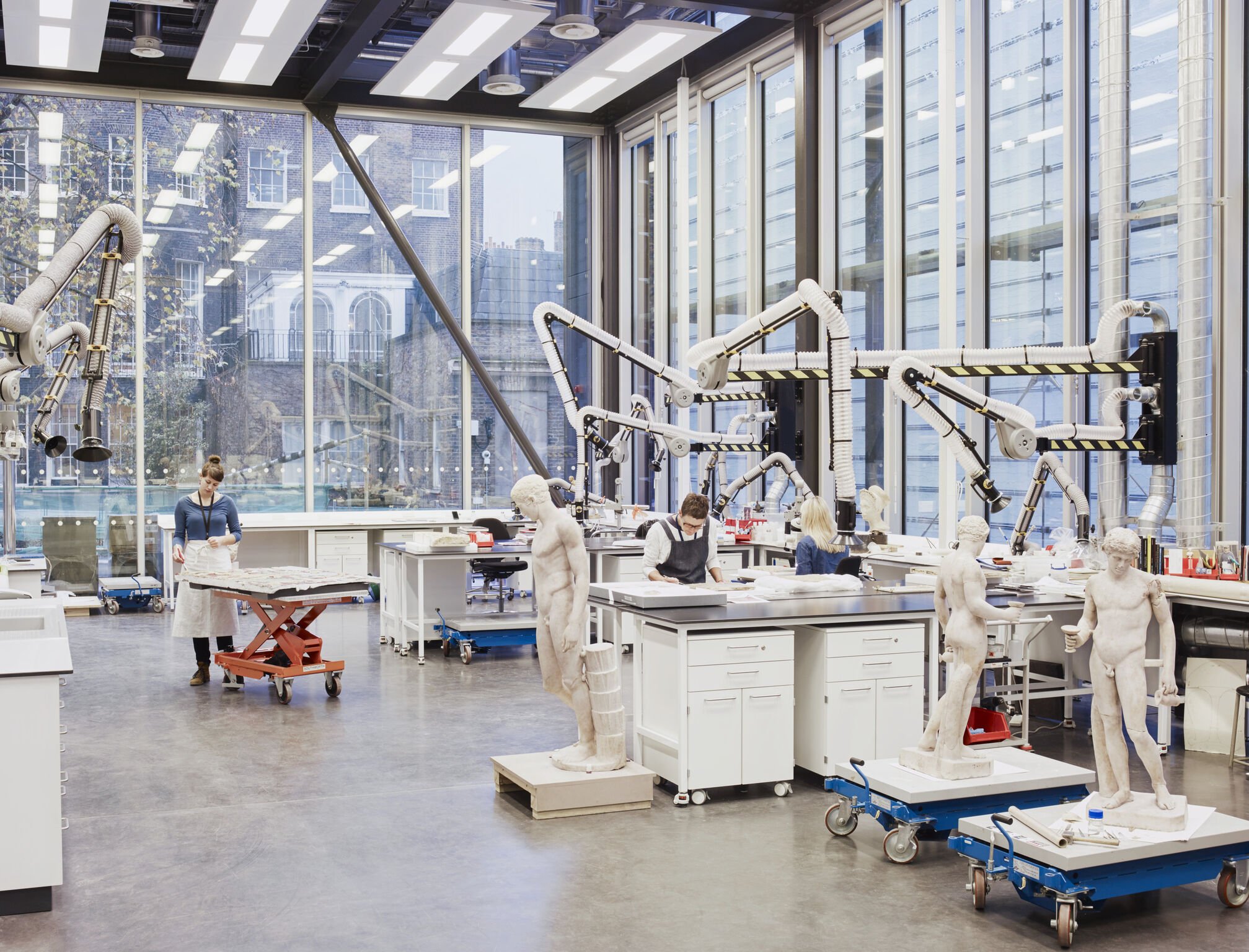 Statue restoration using articulated robot arms at the British Museum