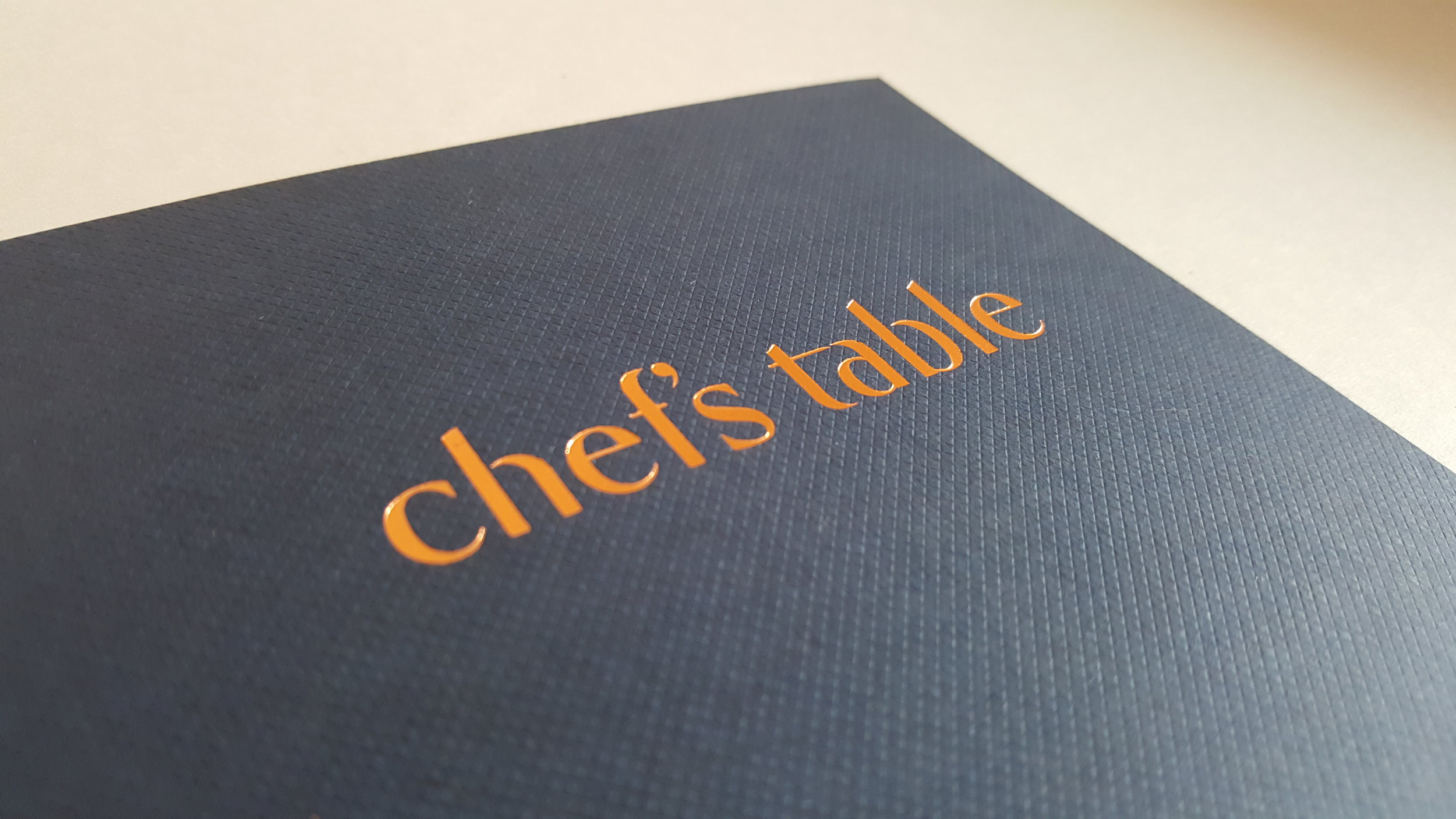 Foil printed menu covers for Chef's Table 