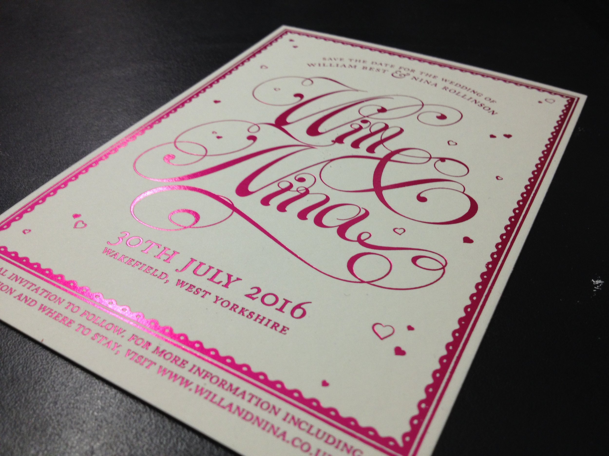 Pink foil printed calligraphic wedding invitations